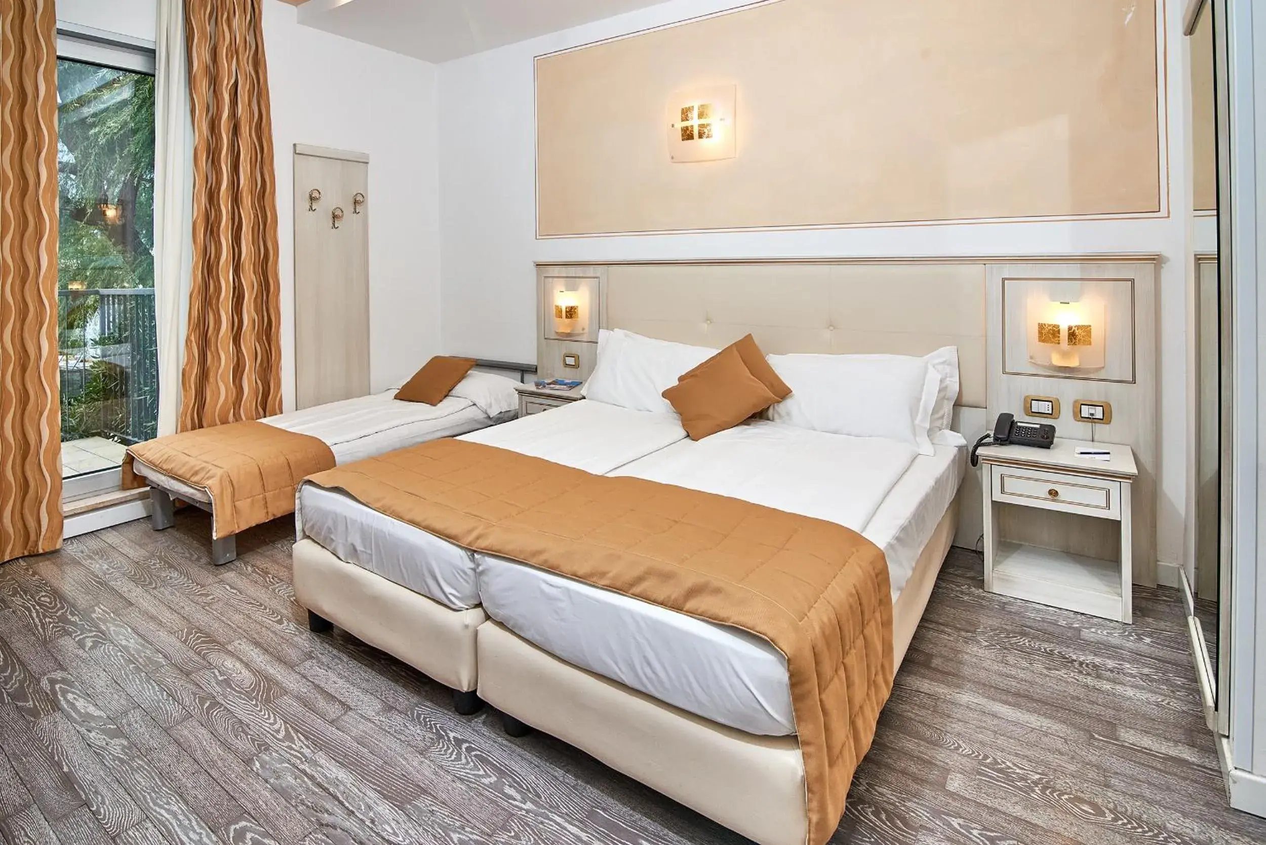 Triple Room with Garden View in Hotel Lido Blu - Surf & Bike Triple Room with Garden View in Hotel Lido Blu - Surf & Bike