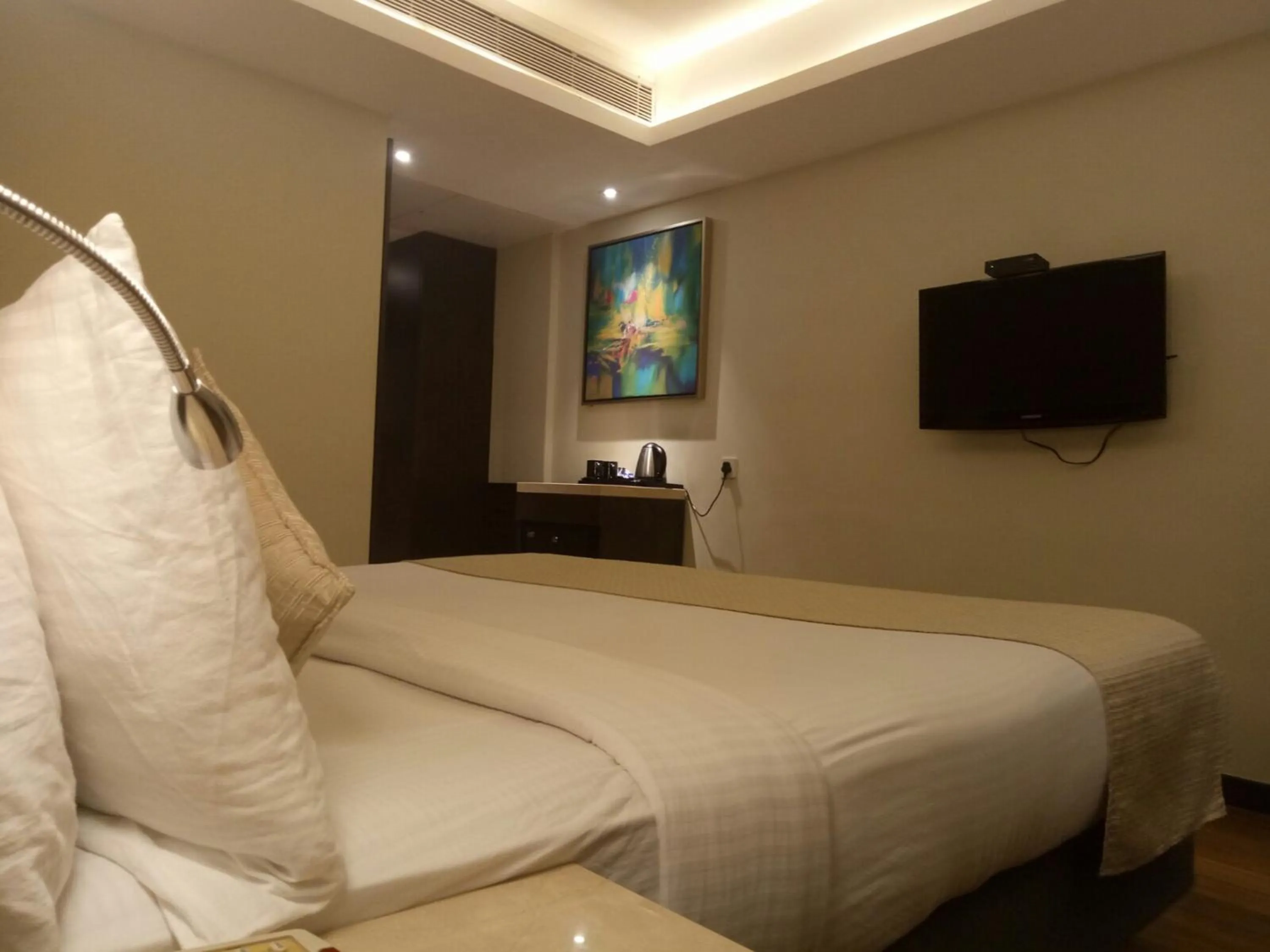 Bedroom, Bed in Ramee Guestline Hotel Bangalore