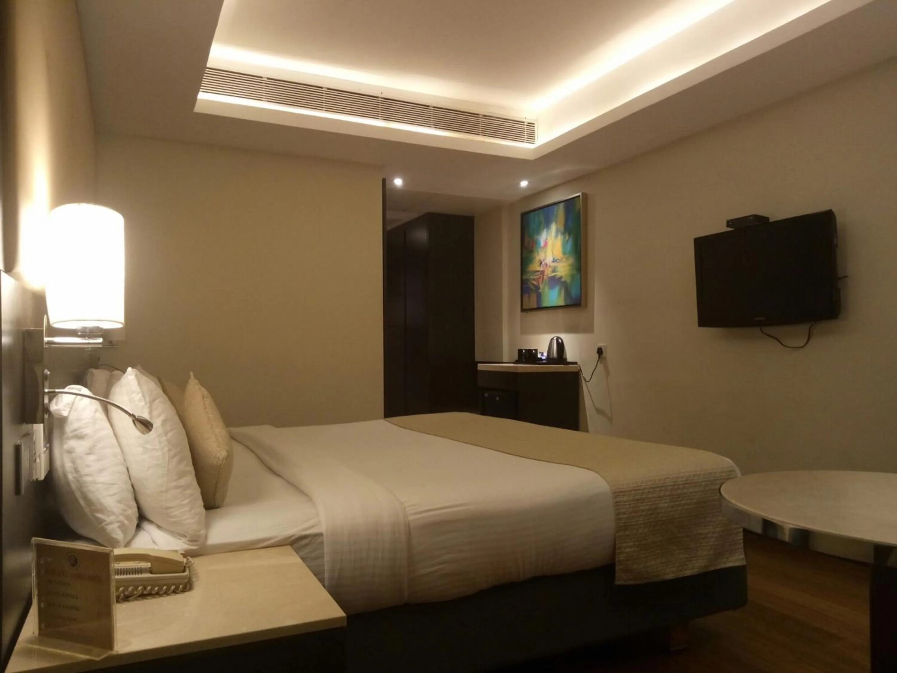 Bedroom, Bed in Ramee Guestline Hotel Bangalore