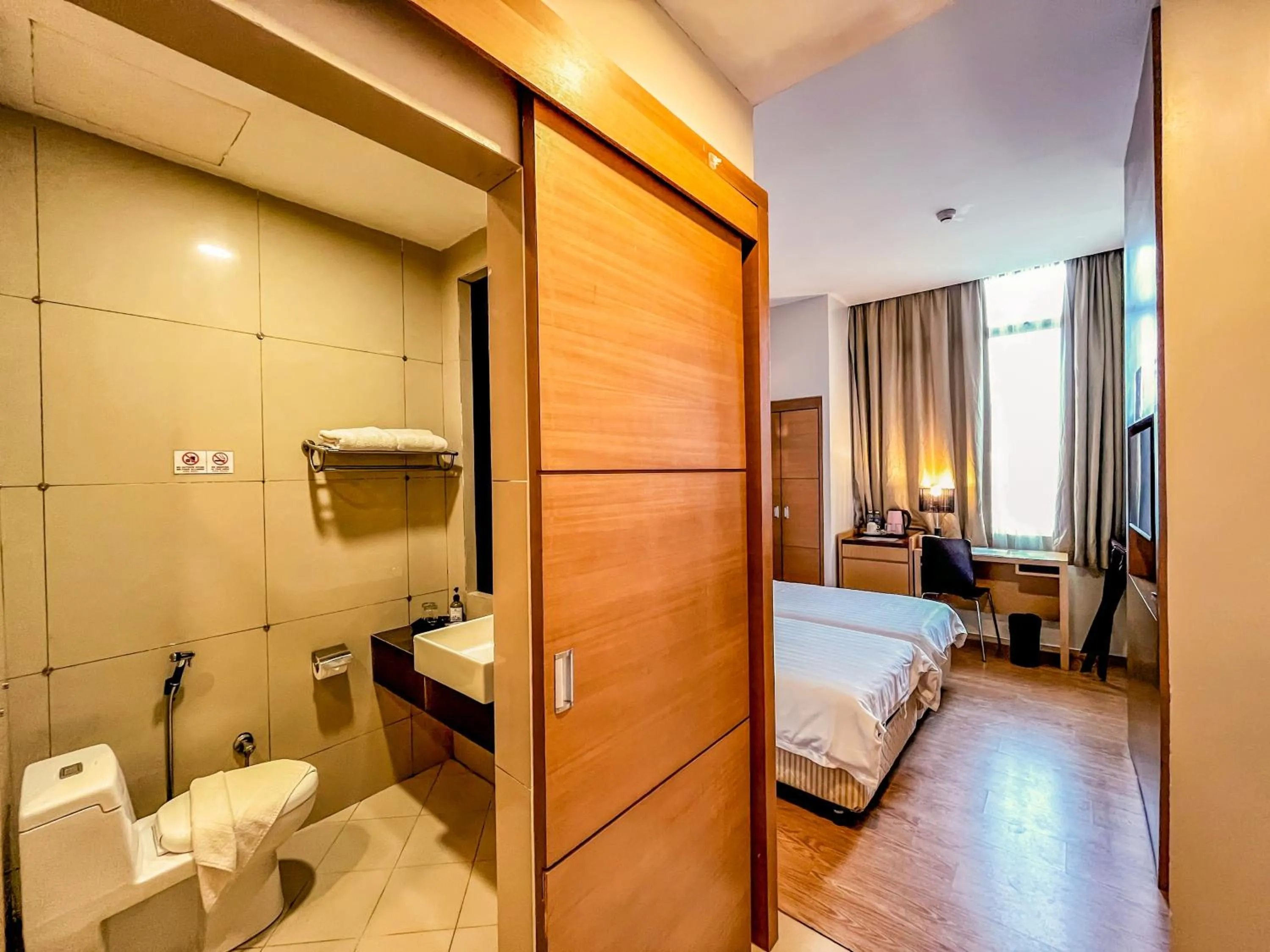 Shower, Bed in Courtyard Hotel 1Borneo