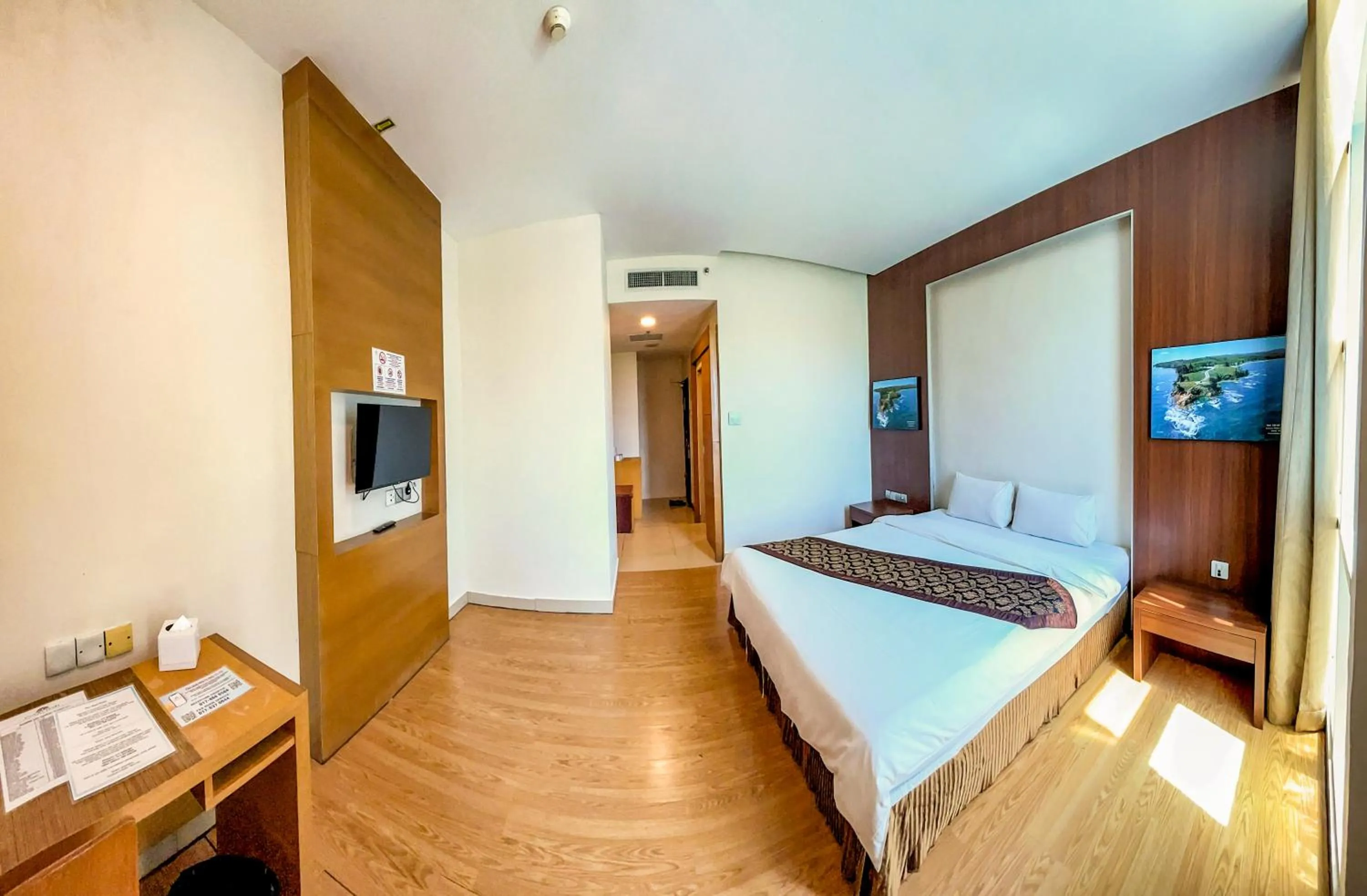 Bed in Courtyard Hotel 1Borneo