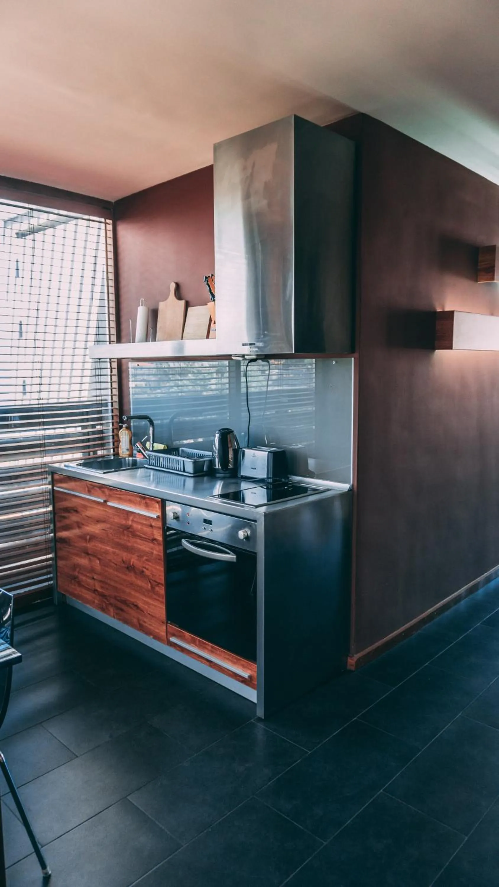 Kitchen or kitchenette in Design Hotel Logatero