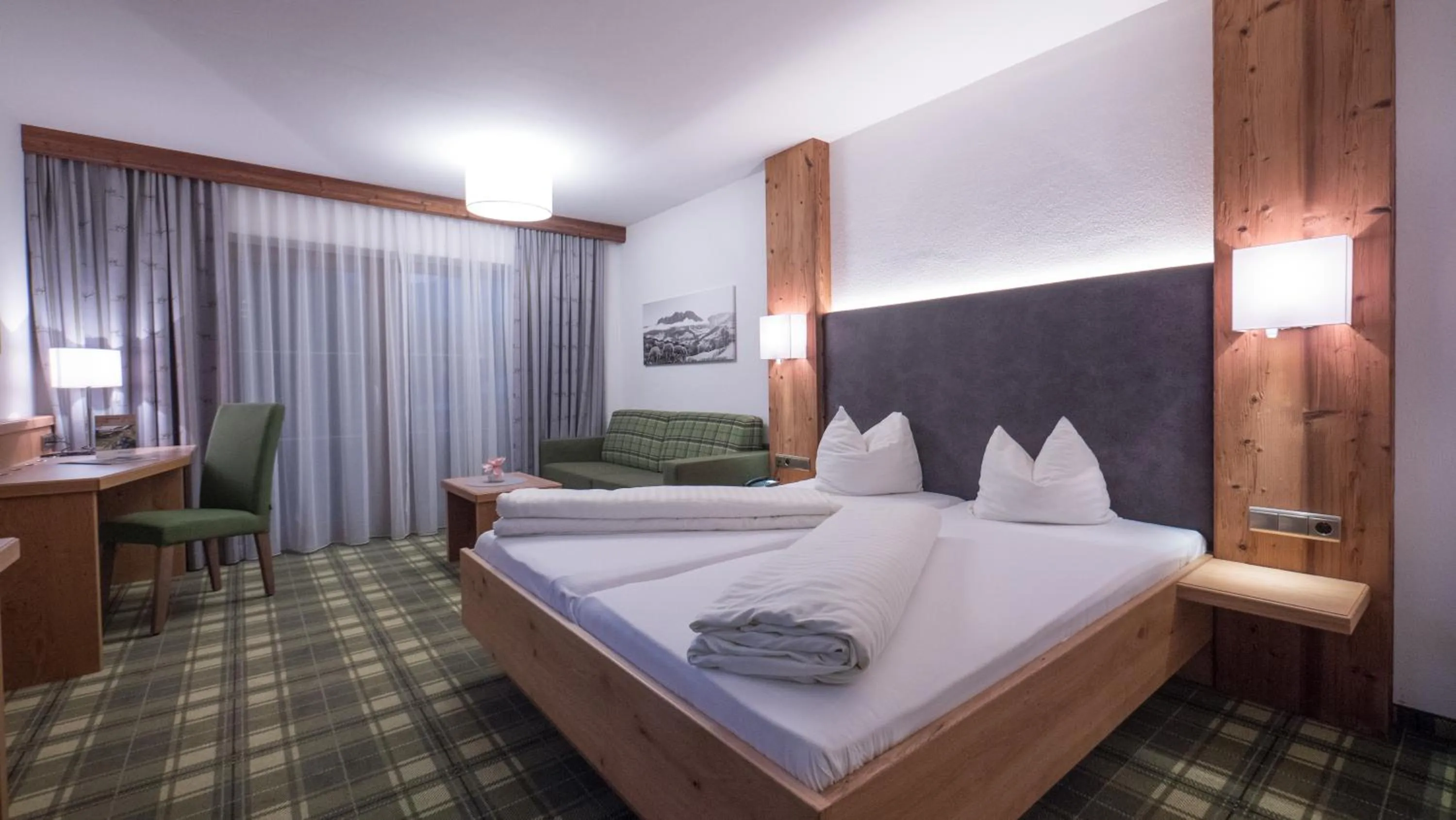 Photo of the whole room, Bed in Hotel Alphof Alpbach