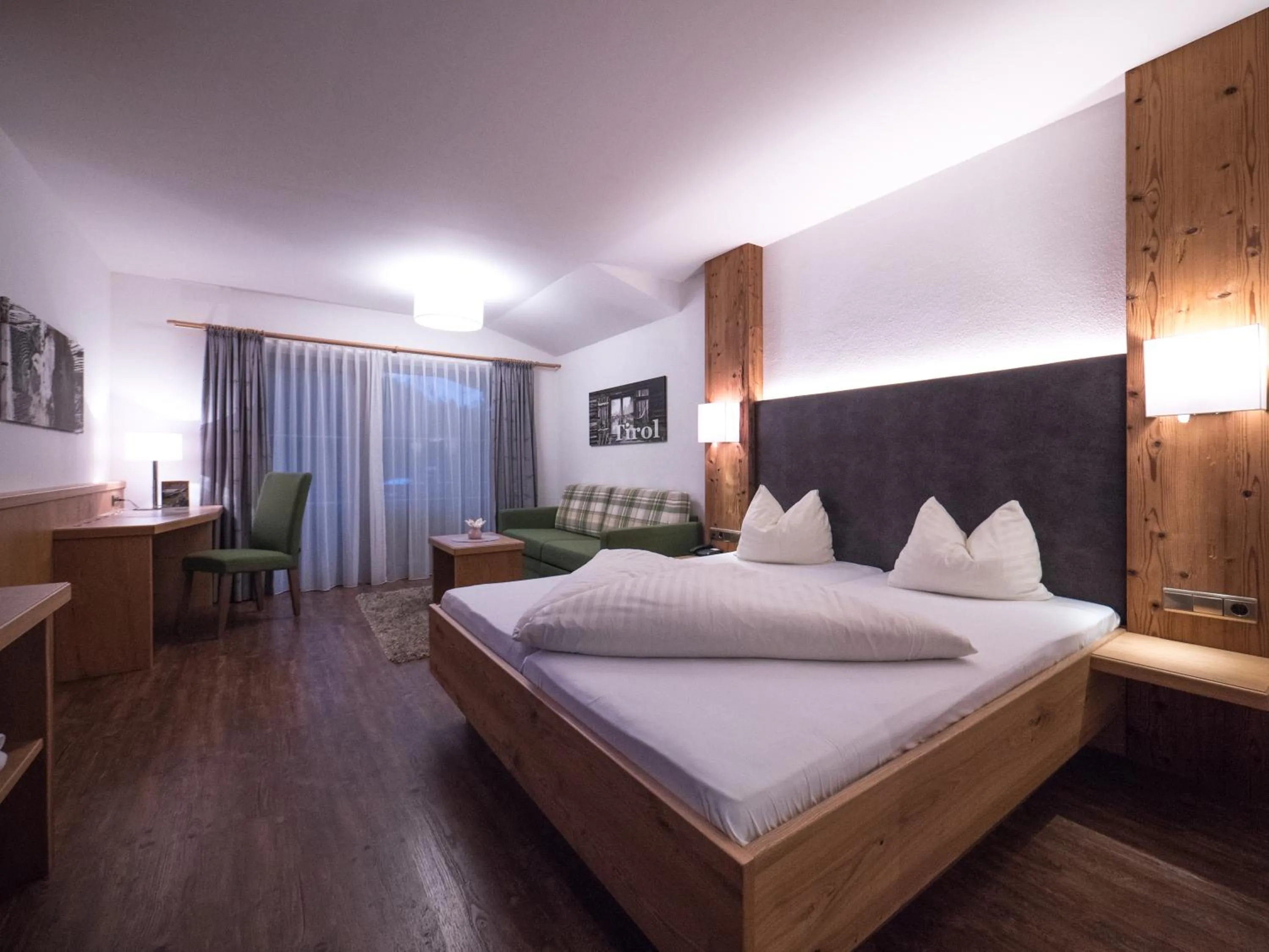 Photo of the whole room, Bed in Hotel Alphof Alpbach