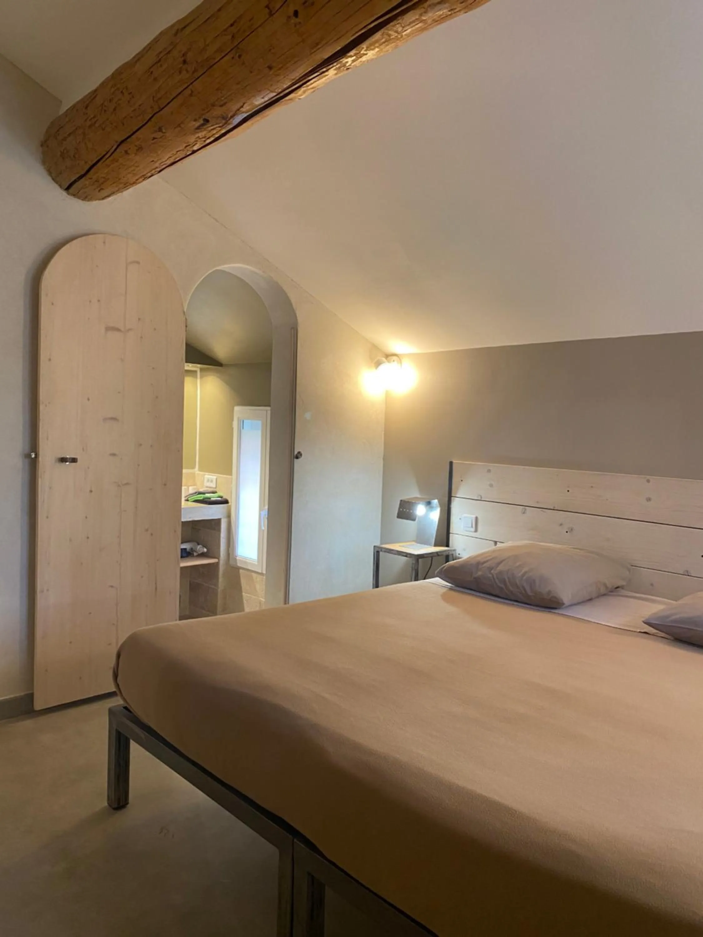 Bed in L'atelier B&B