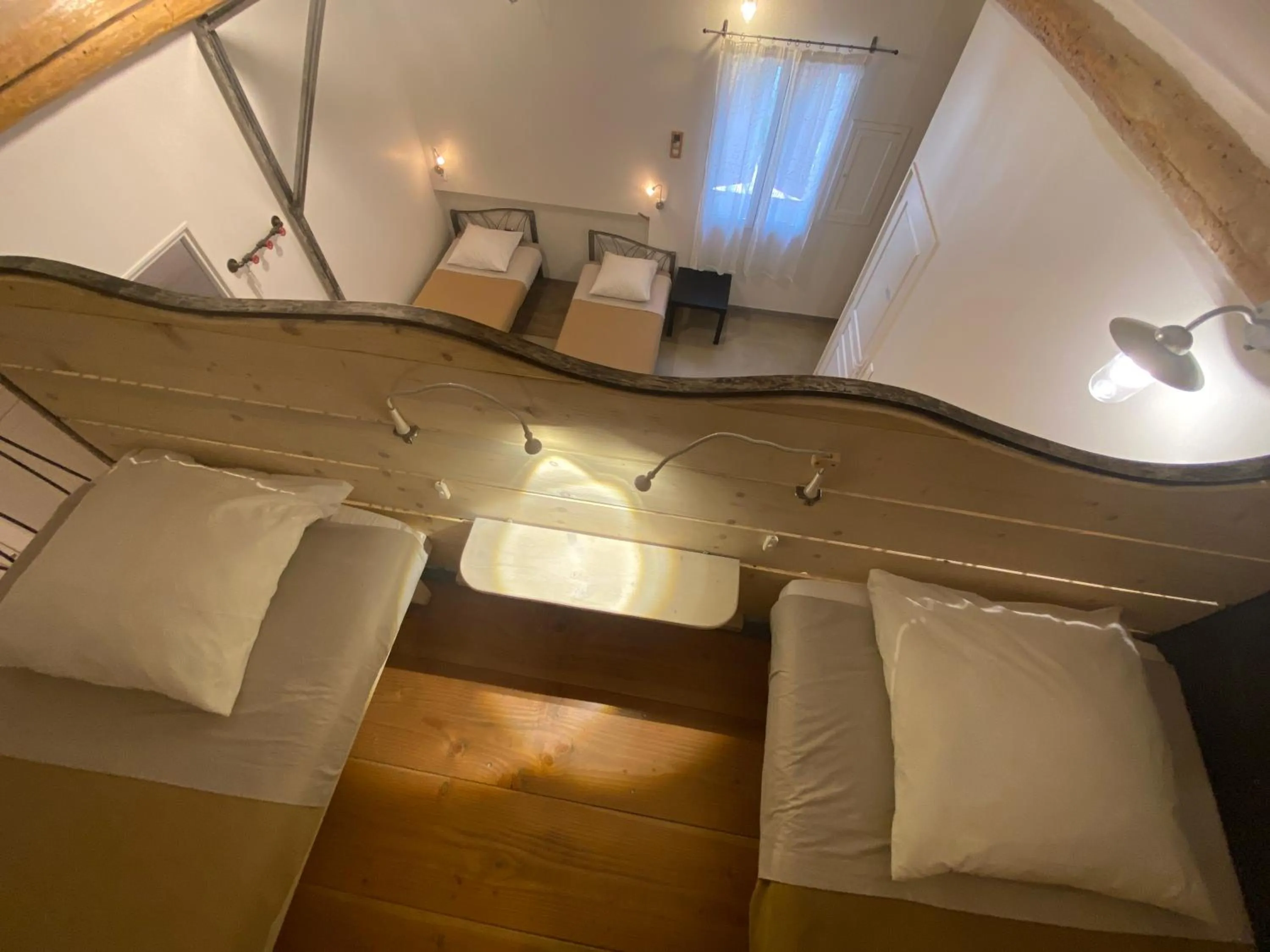 Bed in L'atelier B&B