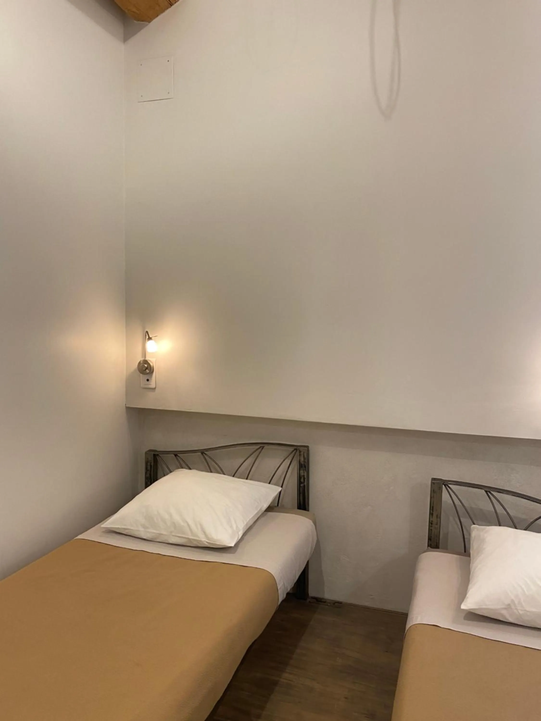 Bed in L'atelier B&B