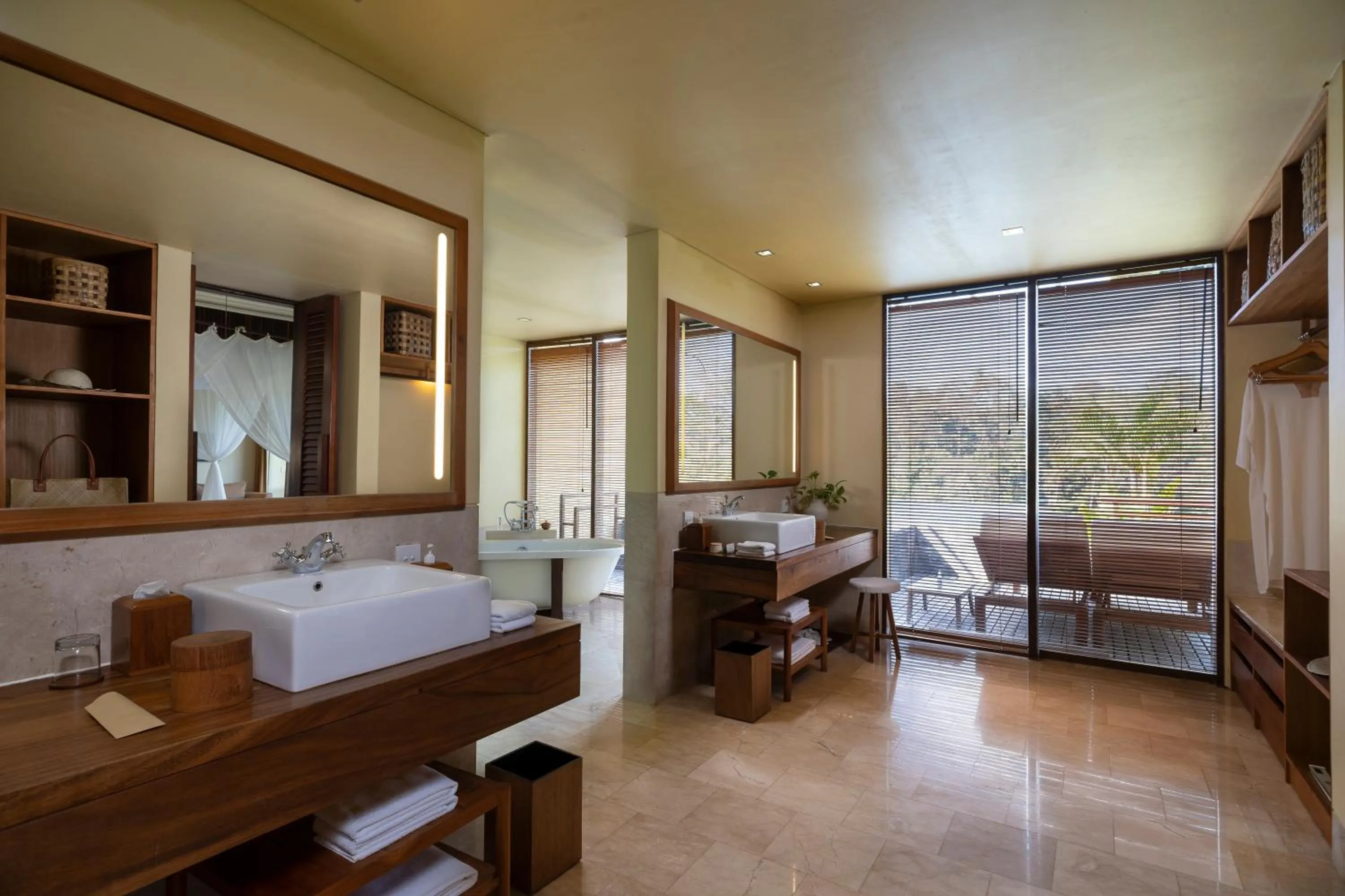 Bathroom, Bed in Komaneka at Tanggayuda Ubud