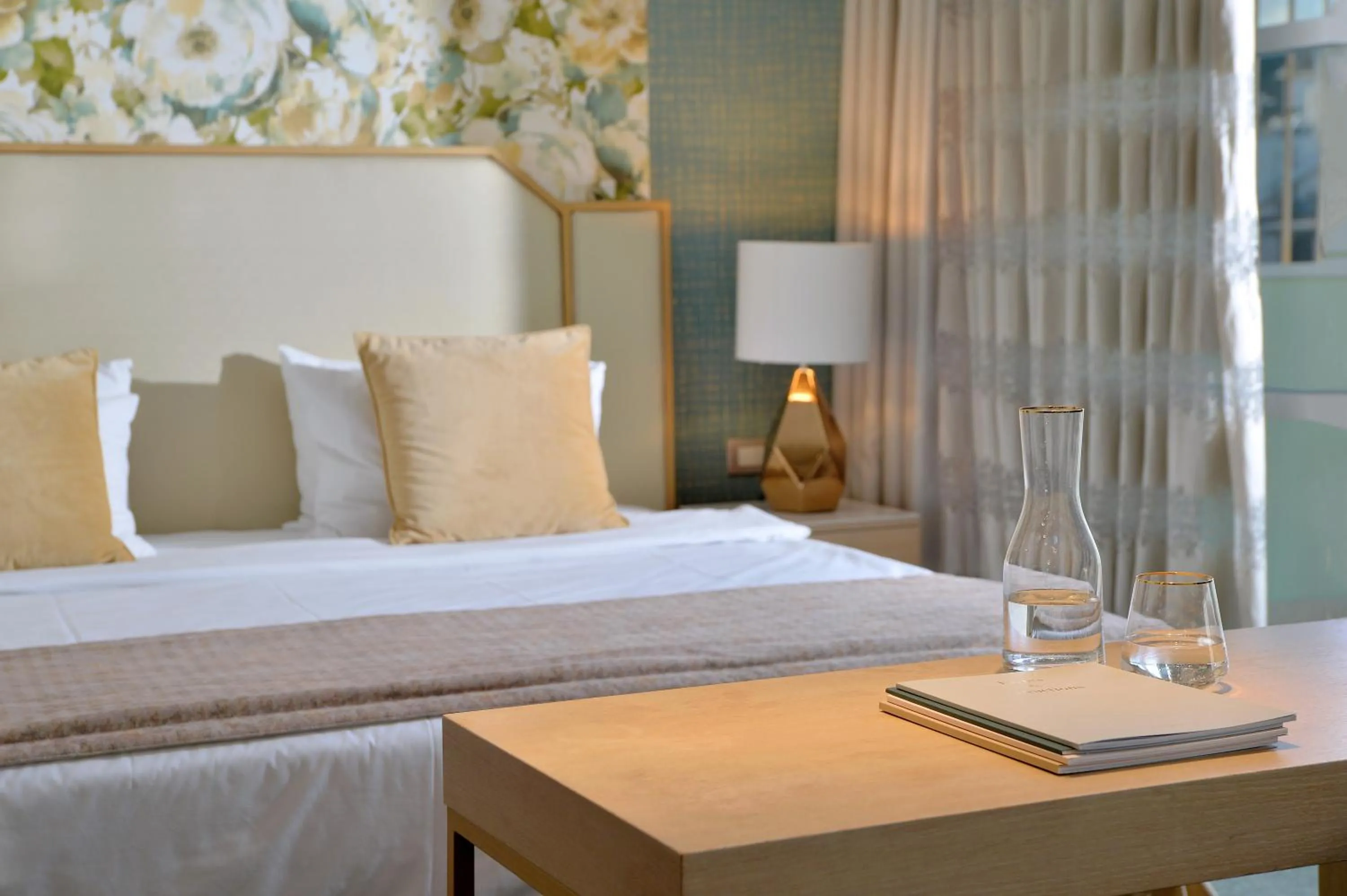 Bed in Airotel Stratos Vassilikos Hotel