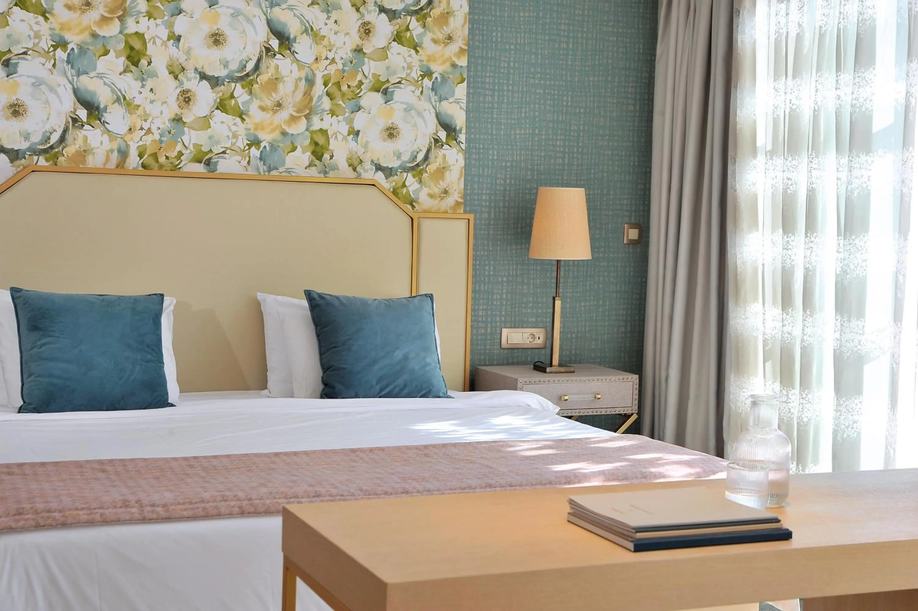 Bed in Airotel Stratos Vassilikos Hotel