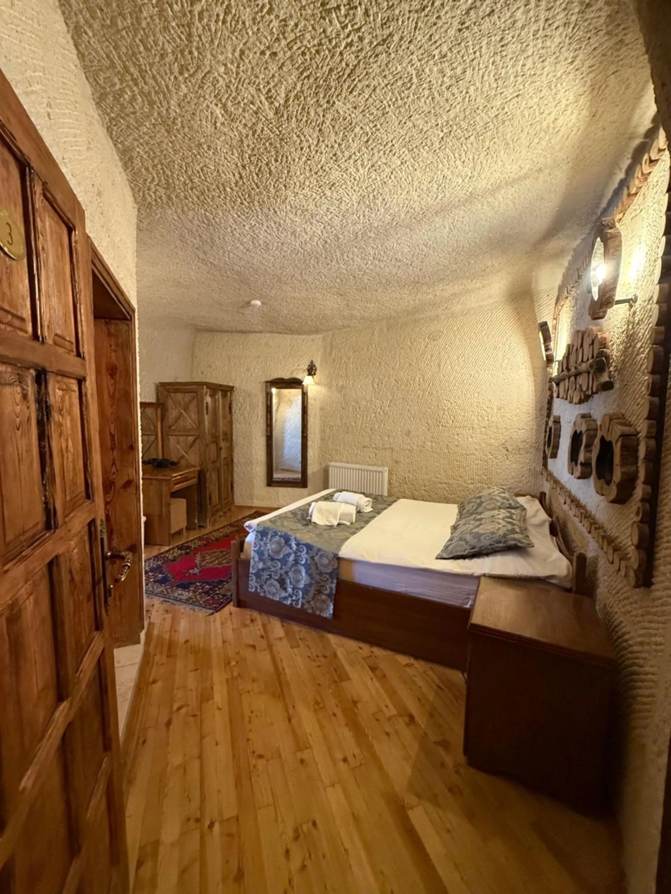 Bed in Arif Cave Hotel