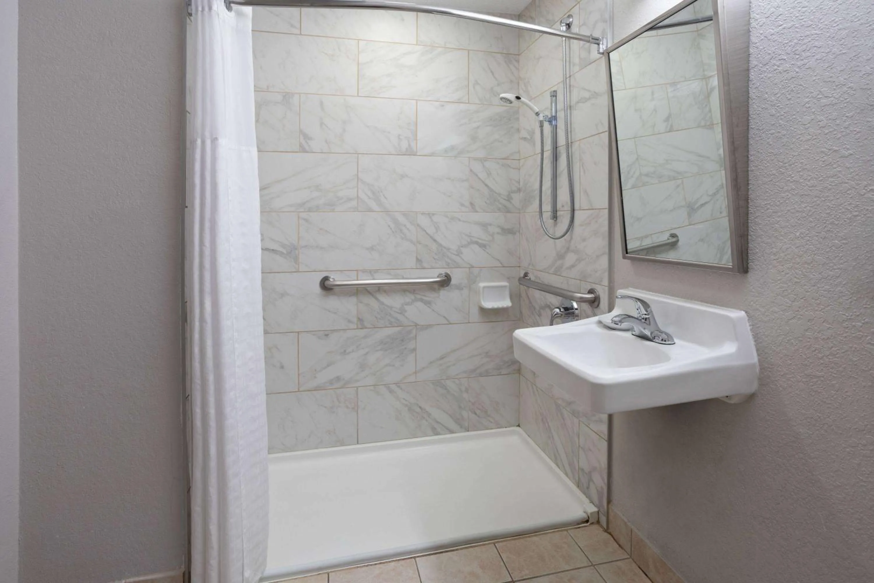 Shower in Microtel Inn & Suites by Wyndham Ann Arbor