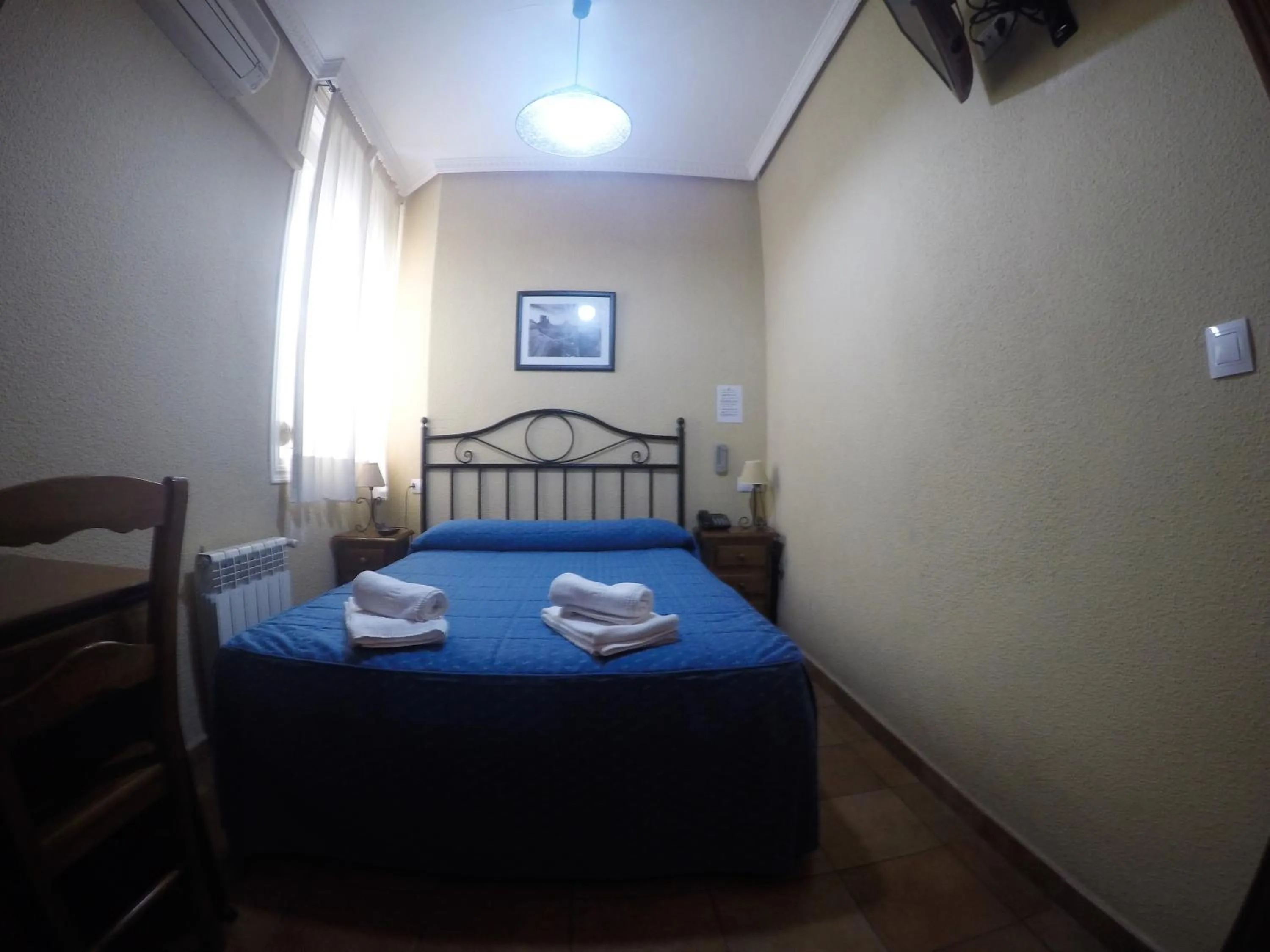 Bedroom, Bed in Hostal El Pilar