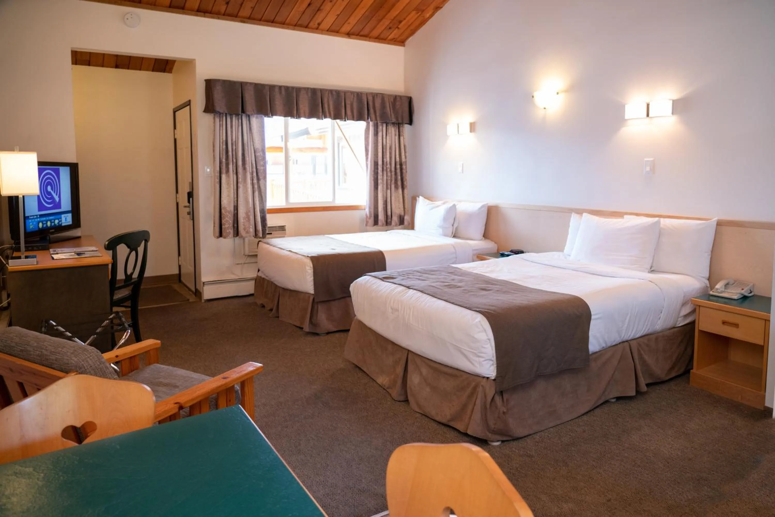 Bed in Rocky Mountain Ski Lodge