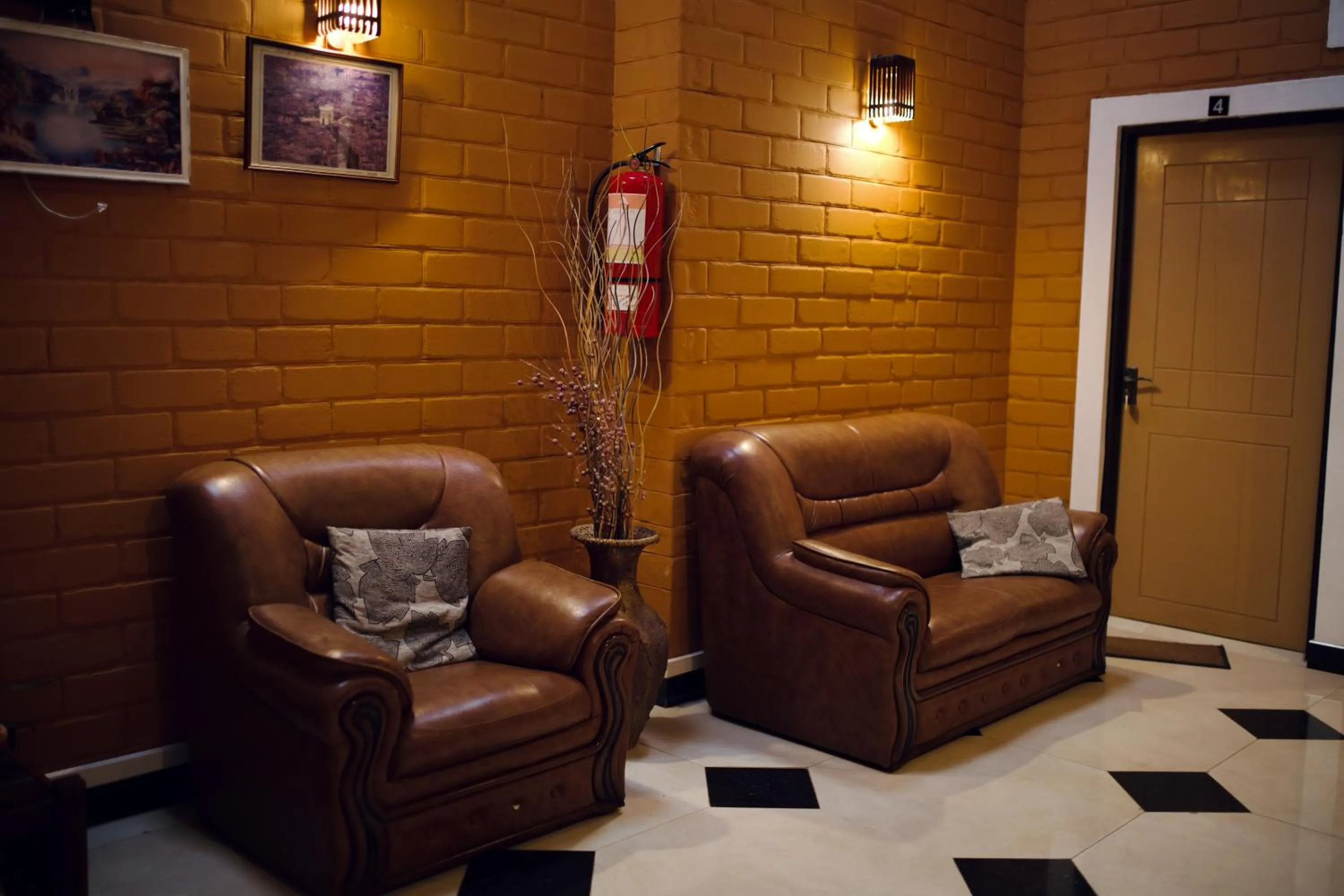 Seating area in Sevenday Hotel