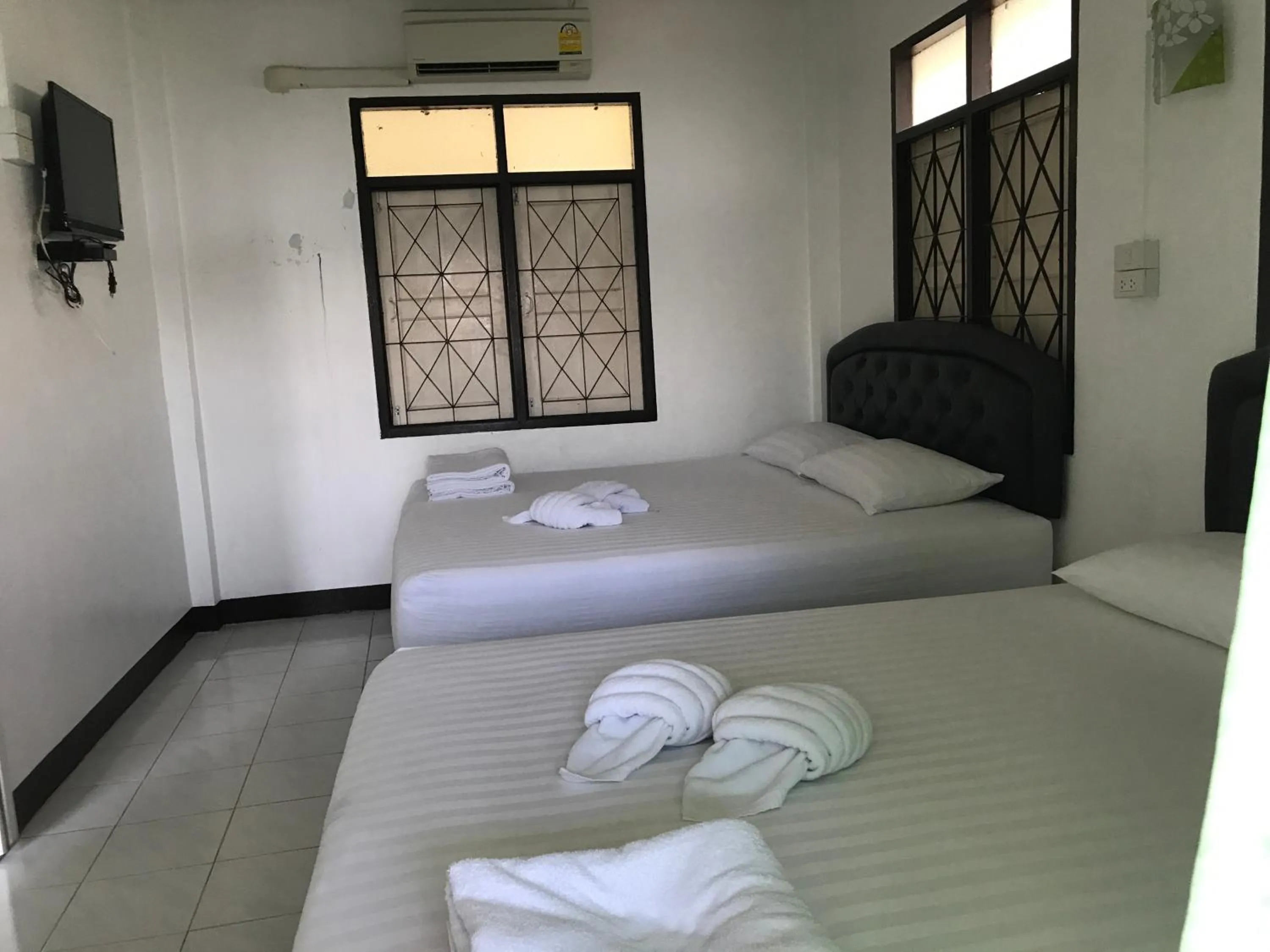 Bed in Rubtawan Sichang Resort