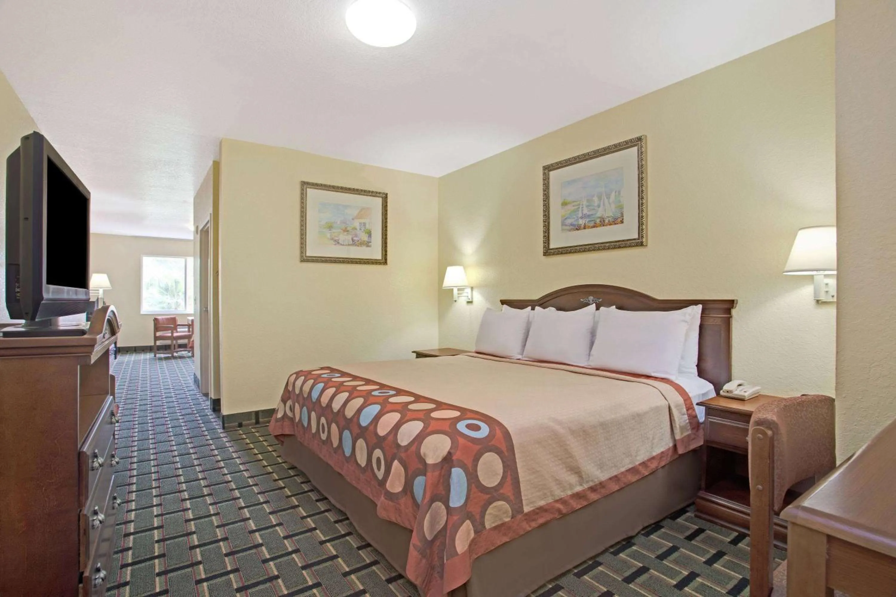 Photo of the whole room, Bed in Super 8 by Wyndham Daytona Beach