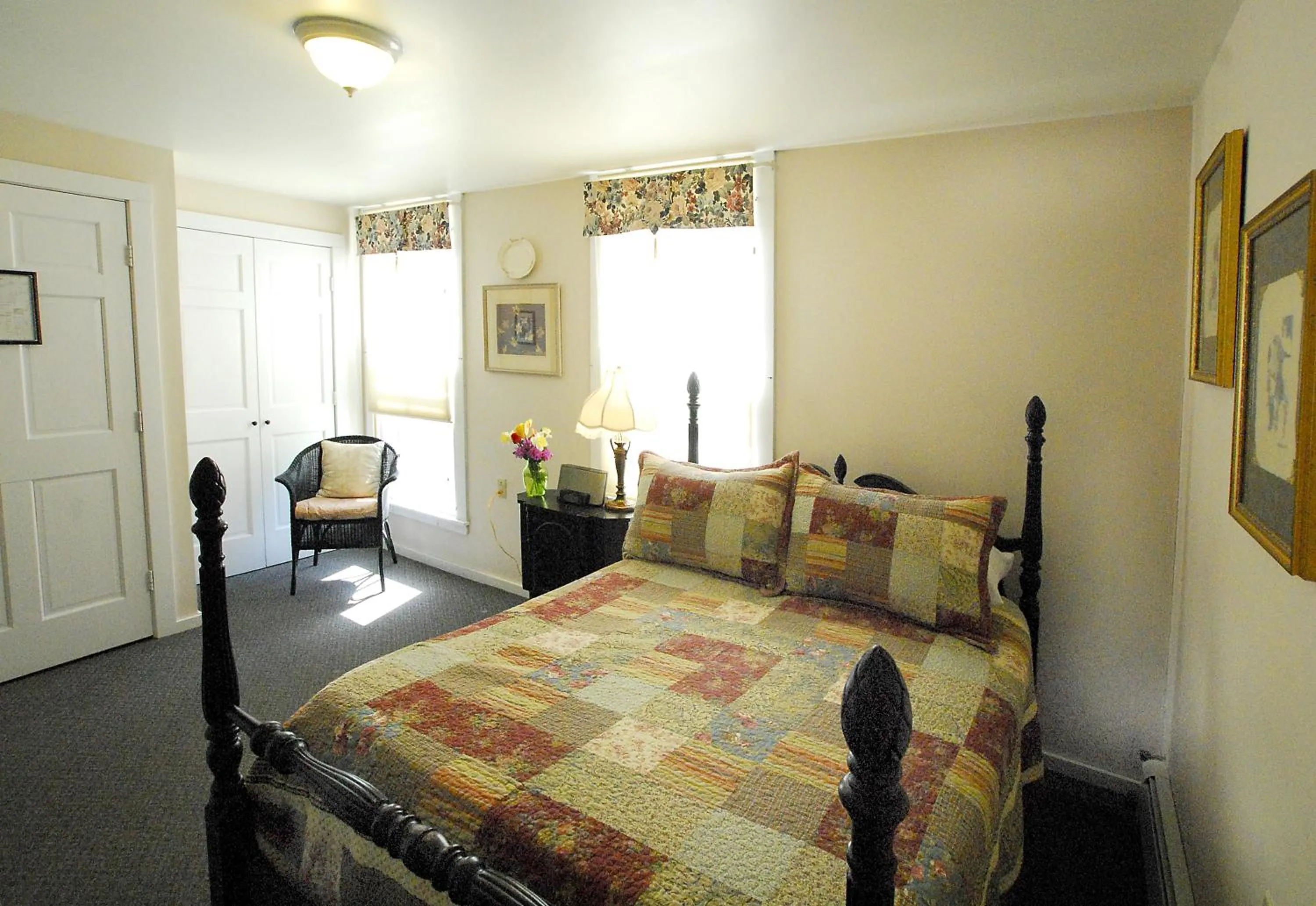 Bed in The Brewster Inn