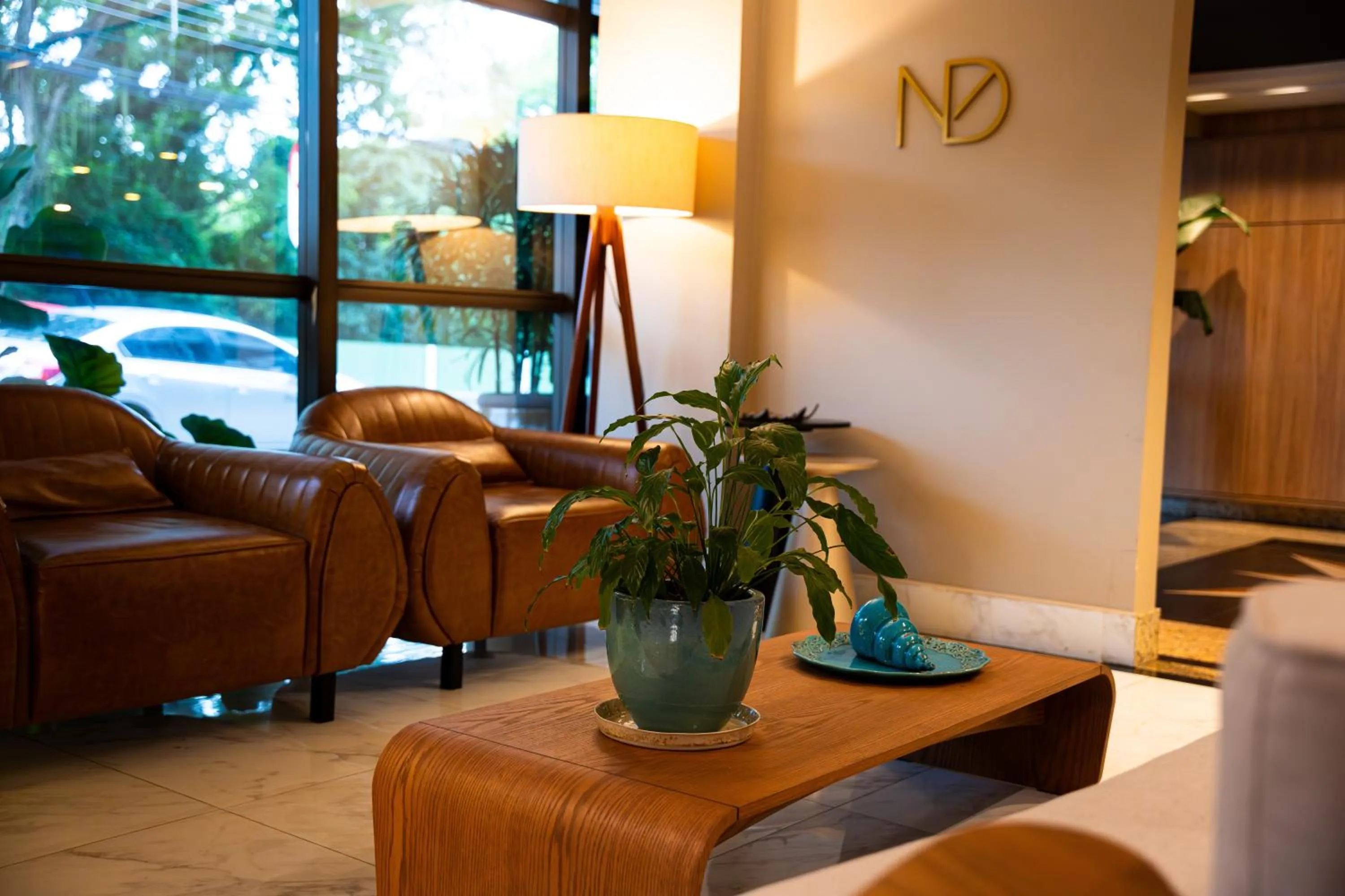 Communal lounge/ TV room in Nadai Confort Hotel e Spa