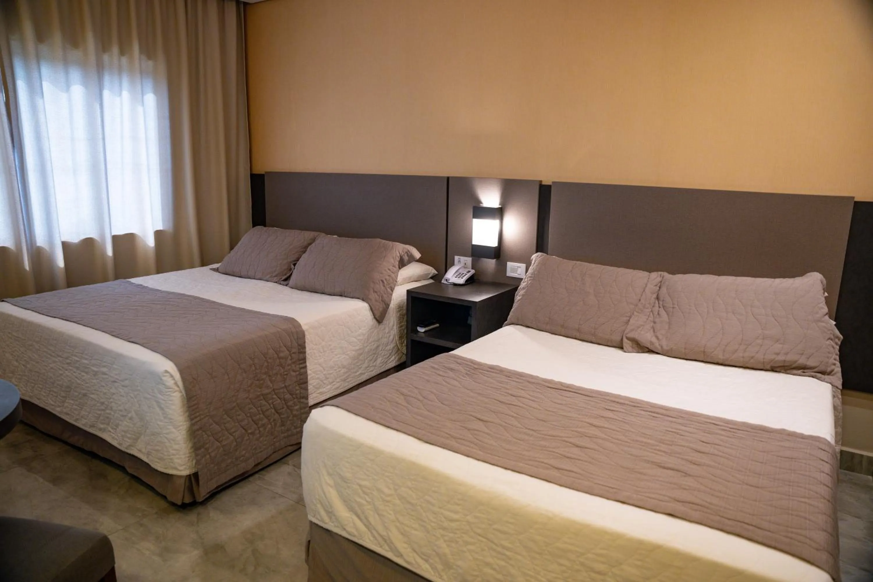 Bed in Nadai Confort Hotel e Spa