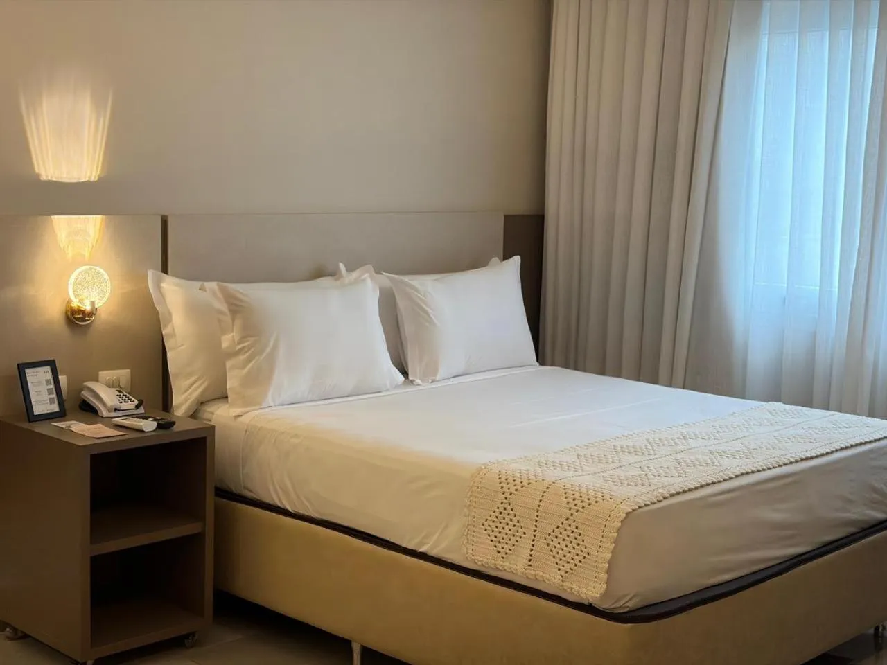 Bed in Nadai Confort Hotel e Spa