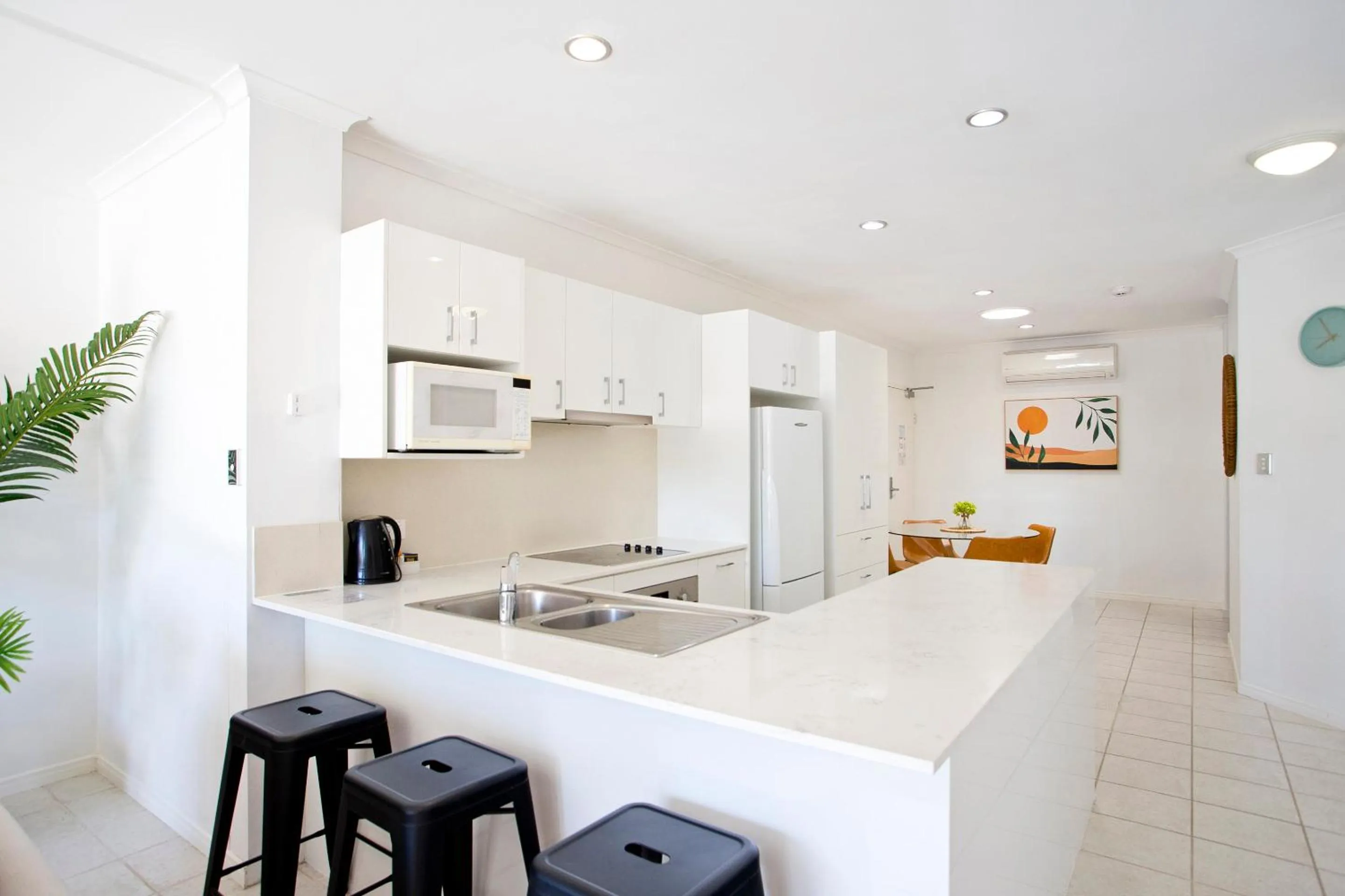 Kitchen or kitchenette in Offshore Noosa Resort