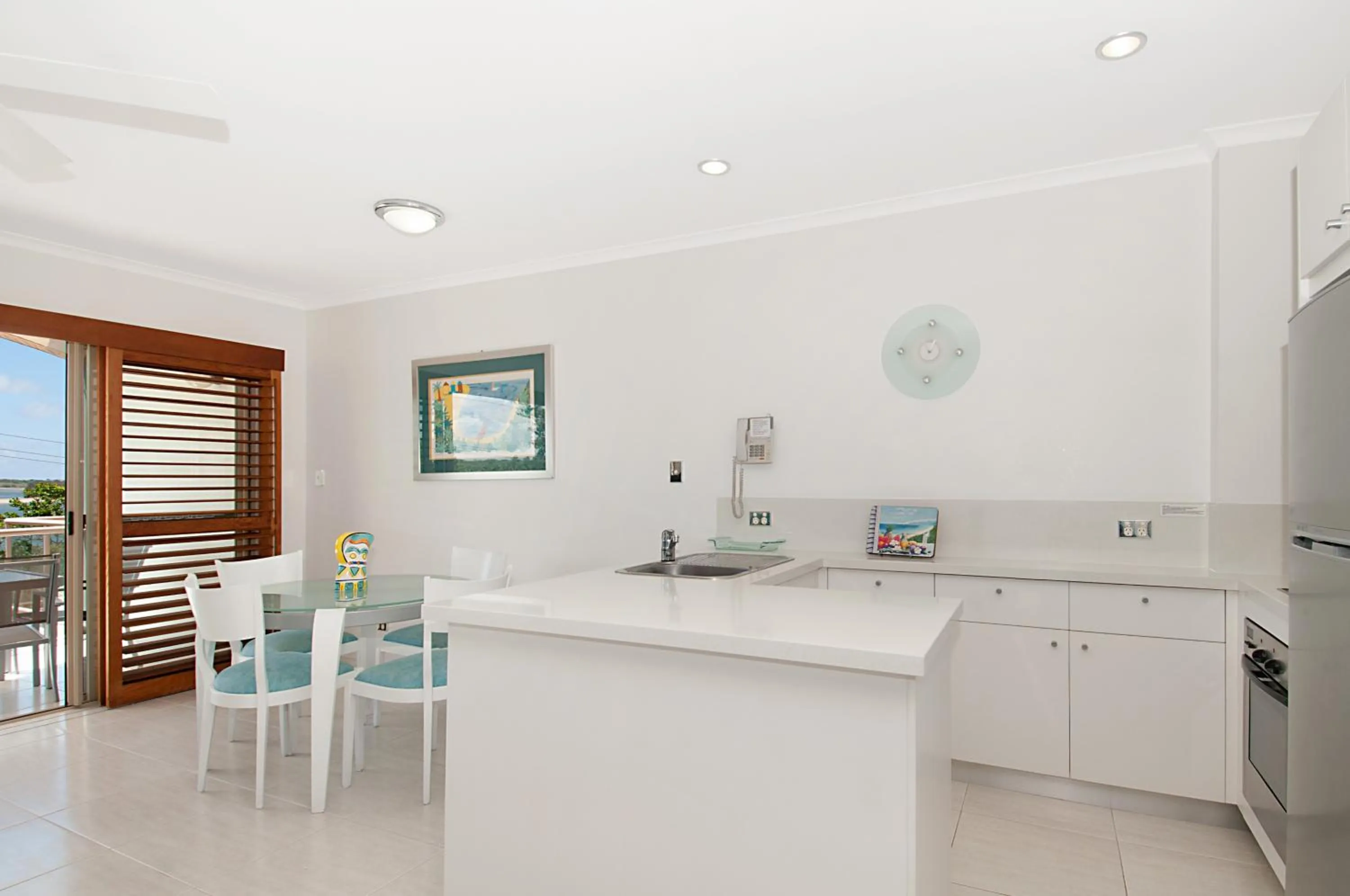 Kitchen or kitchenette in Offshore Noosa Resort