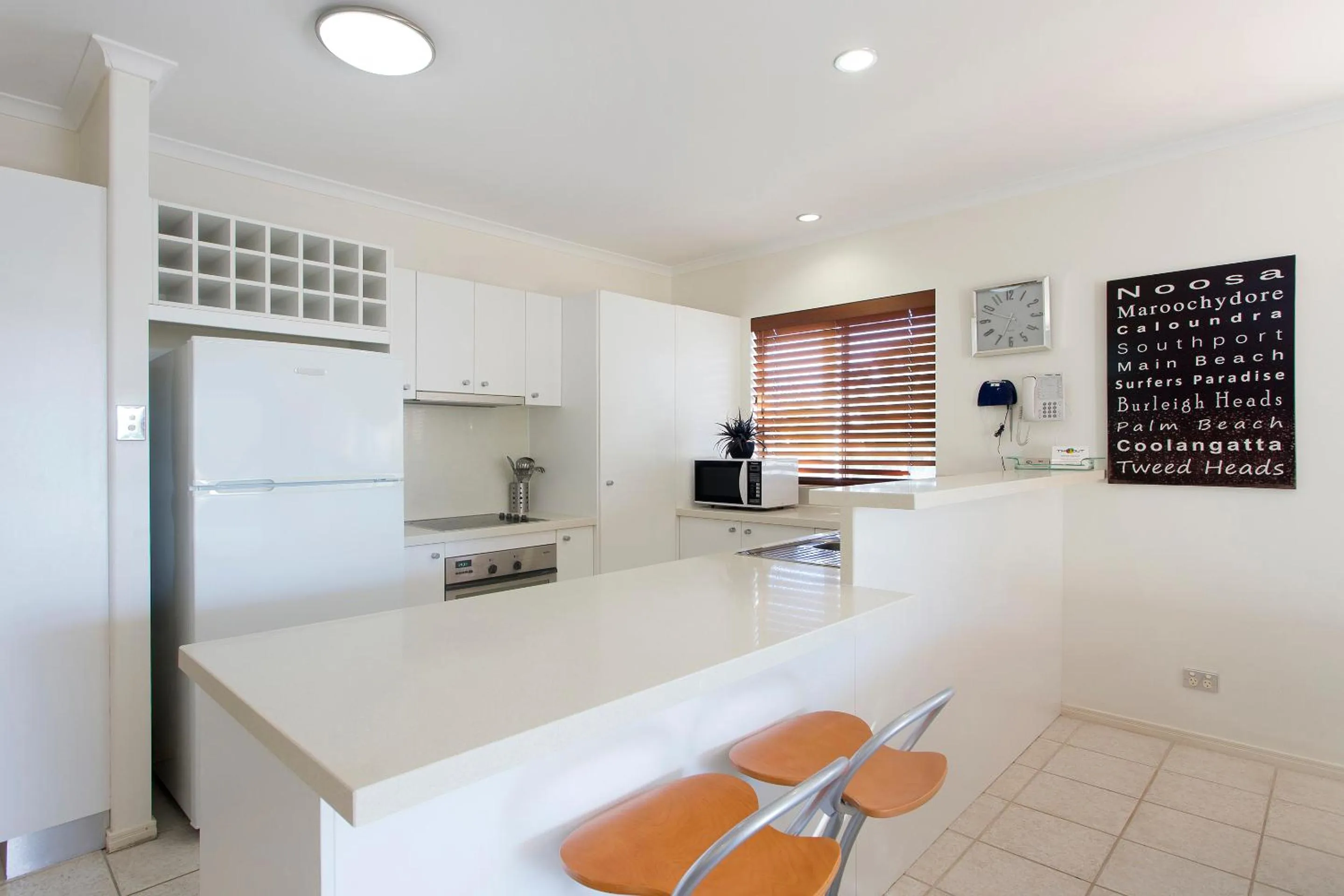 Kitchen or kitchenette in Offshore Noosa Resort