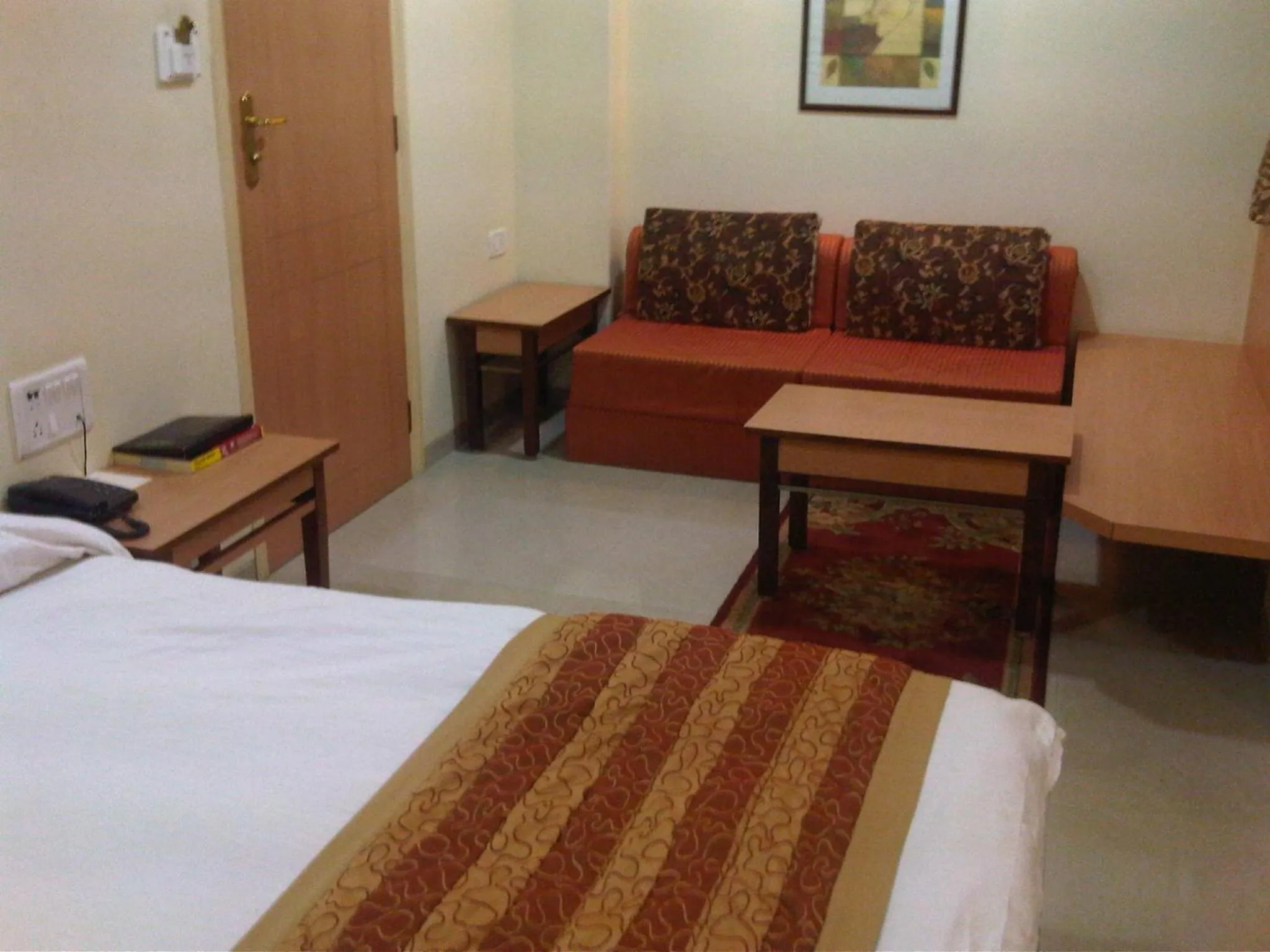 Seating area, Bed in Chateau Windsor Hotel - Marine Drive