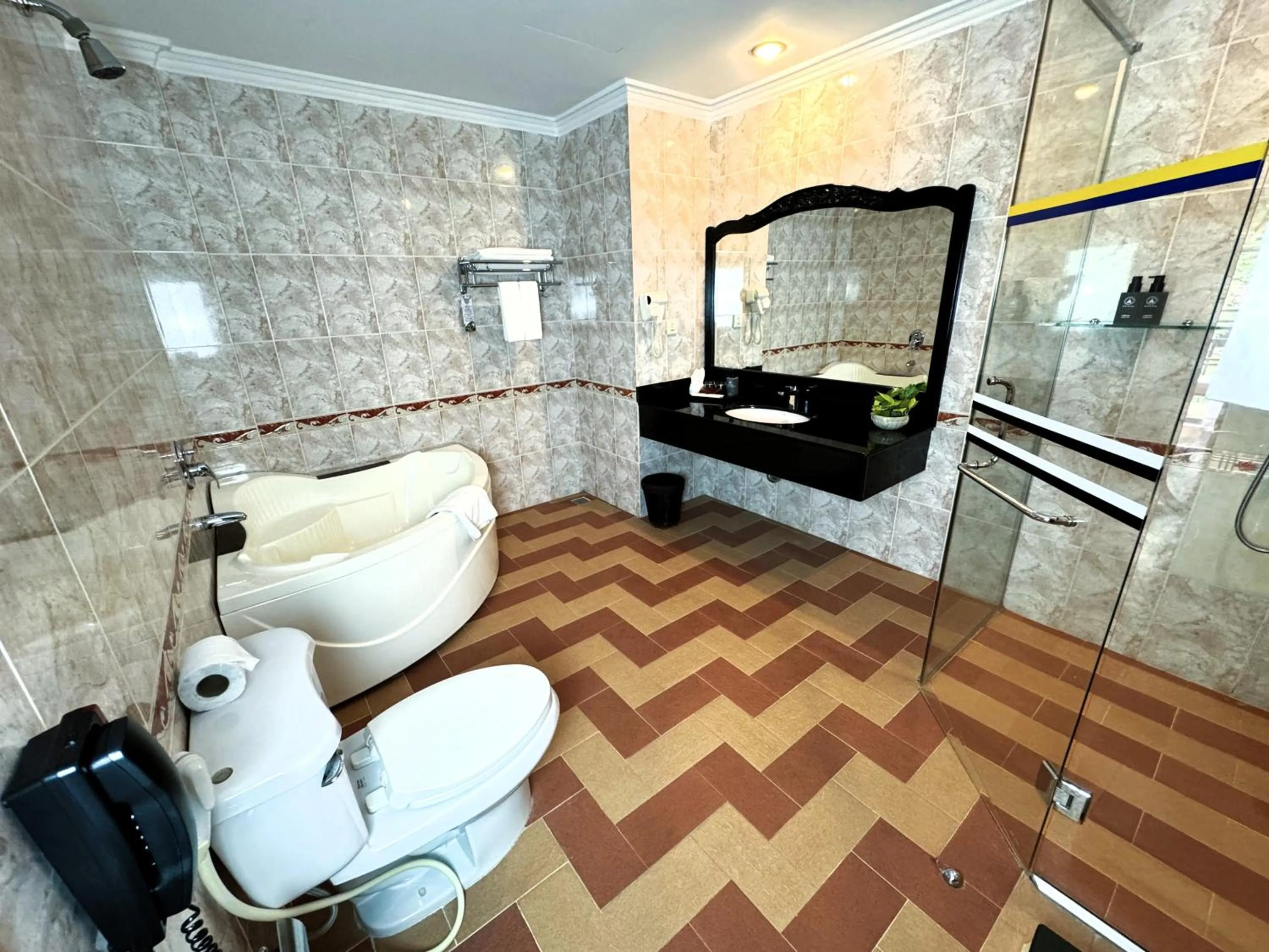 Bathroom in Hotel Somadevi Angkor Resort & Spa