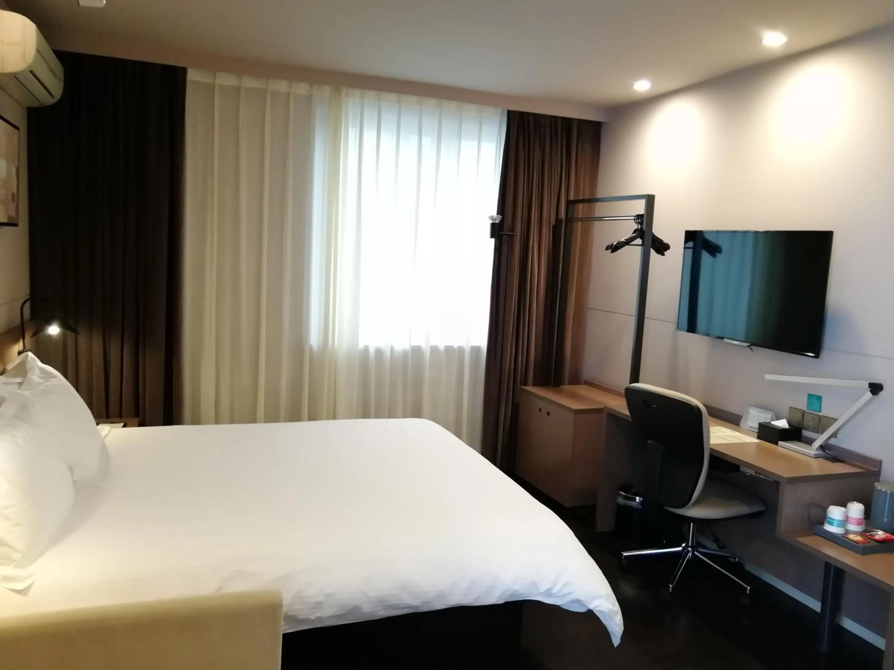Bed in Jinjiang Inn –The Mixc Subway, Nanning