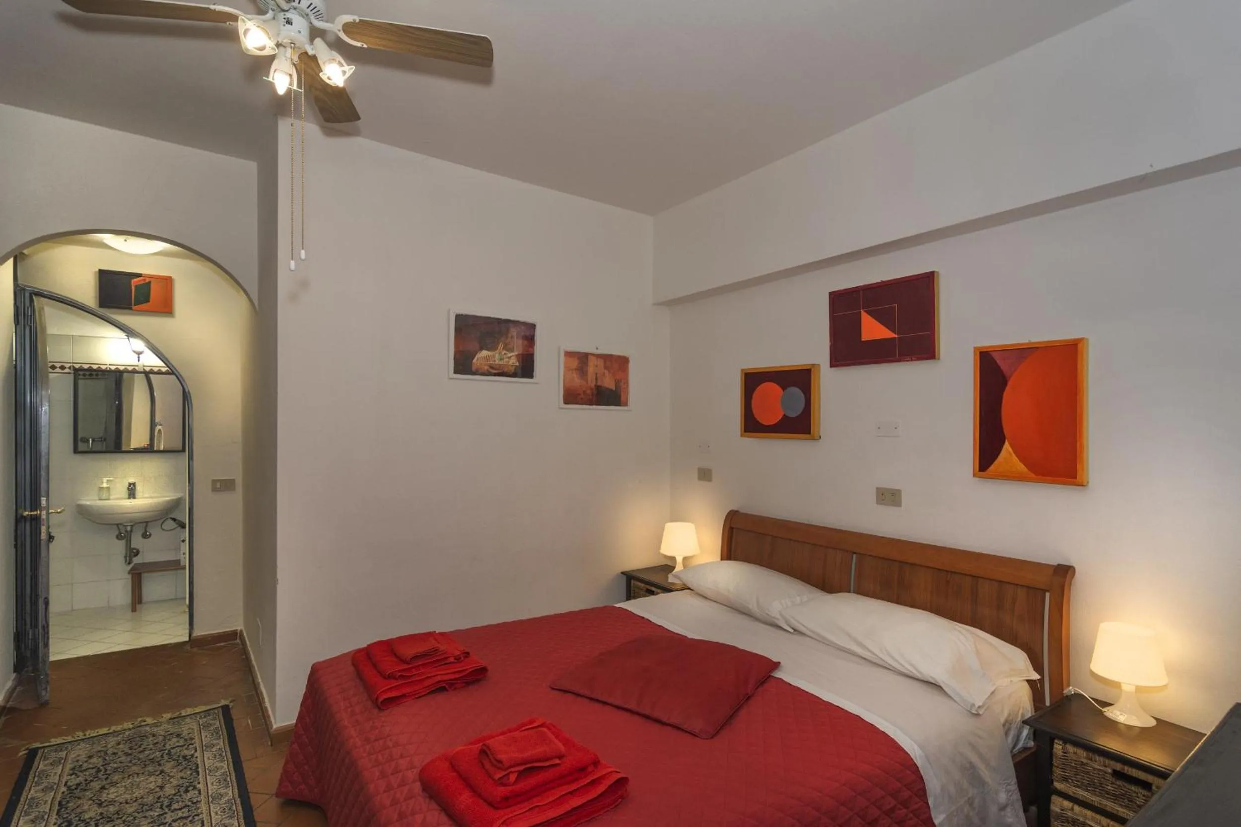 Photo of the whole room, Bed in Il Cielo di Lucio