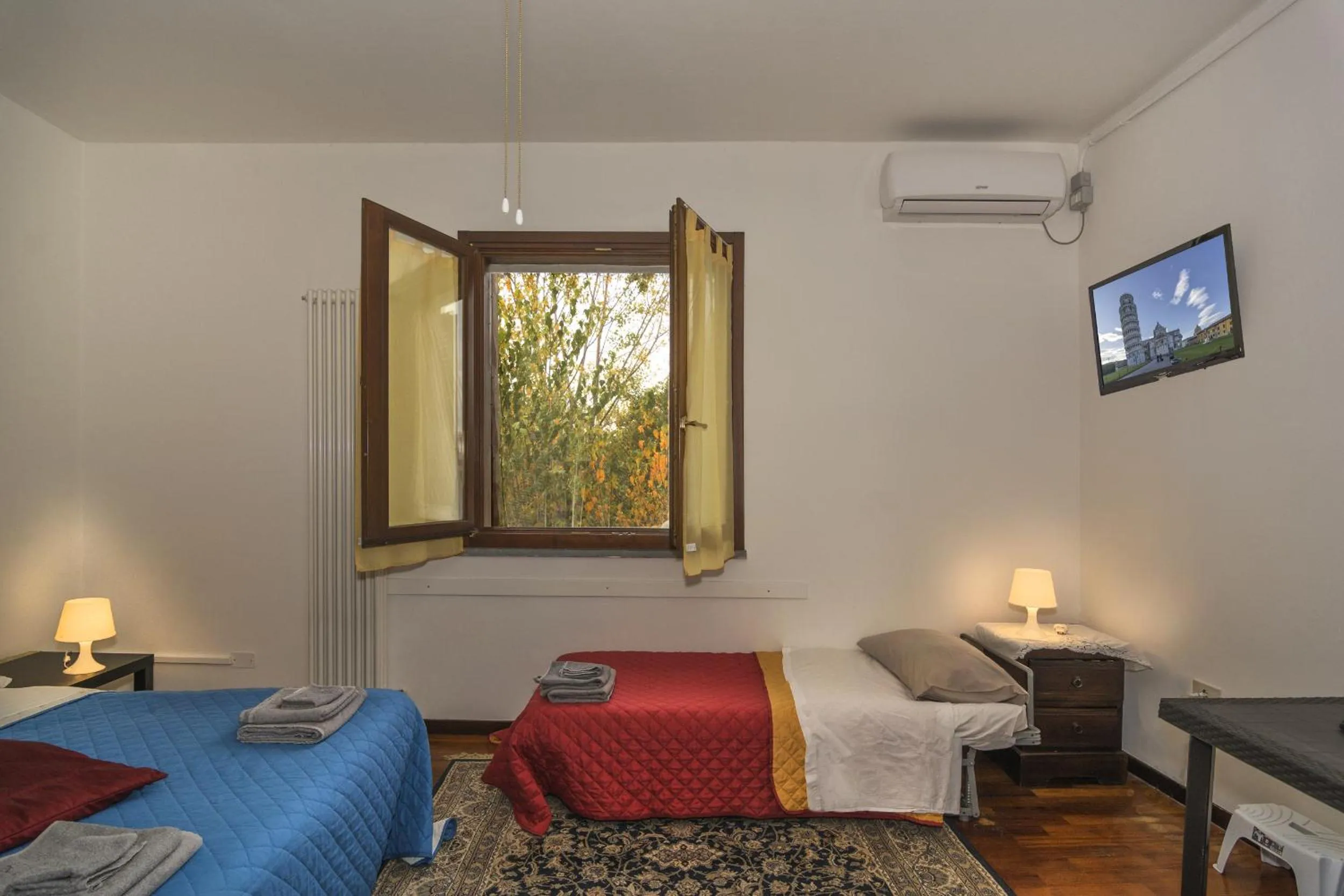 Photo of the whole room, Bed in Il Cielo di Lucio