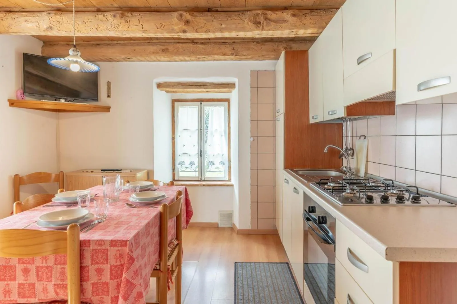 Kitchen or kitchenette in Chalet Musiera