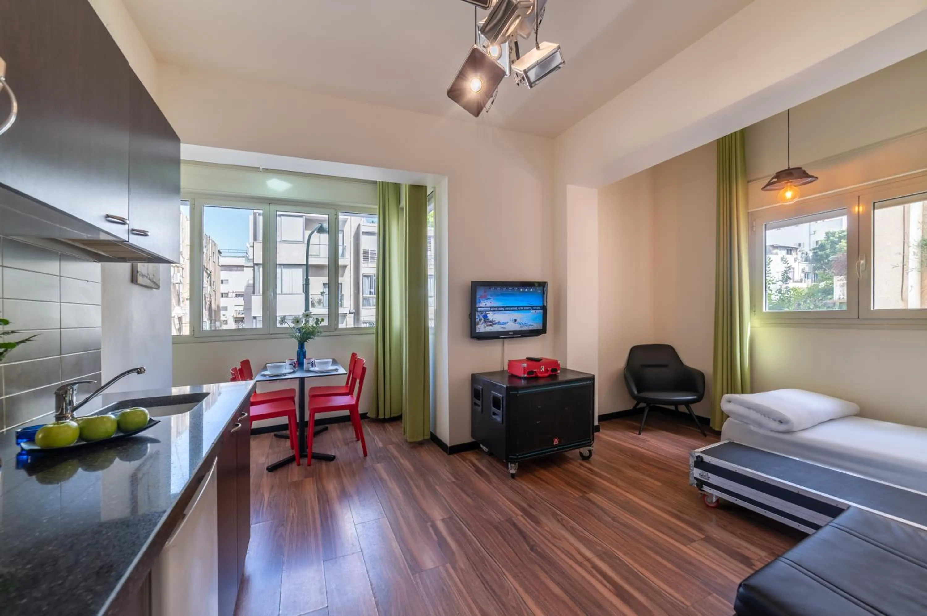 Living room, Bed in Ben Yehuda Apartments