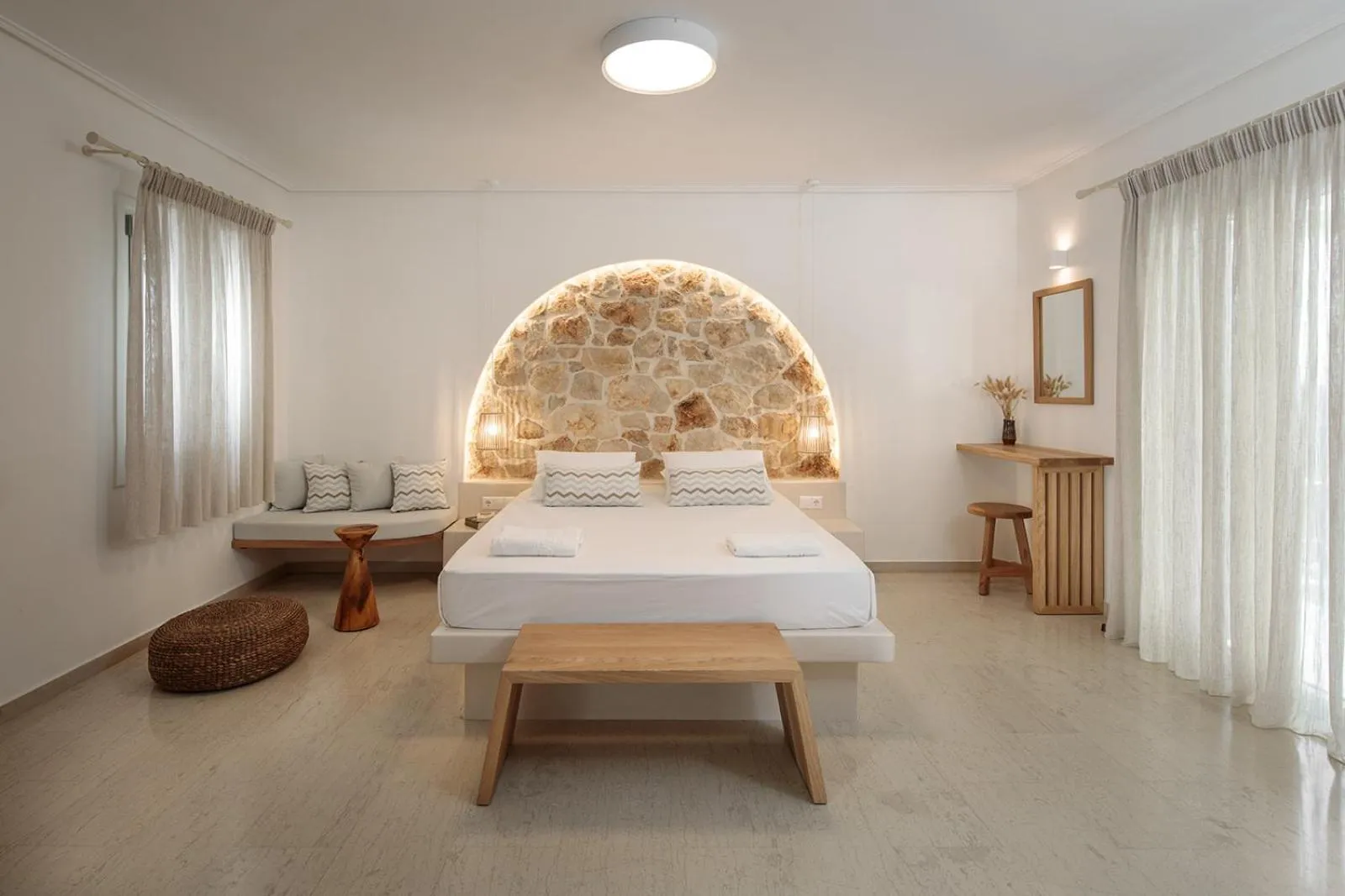 Bed in Proteas Hotel & Suites