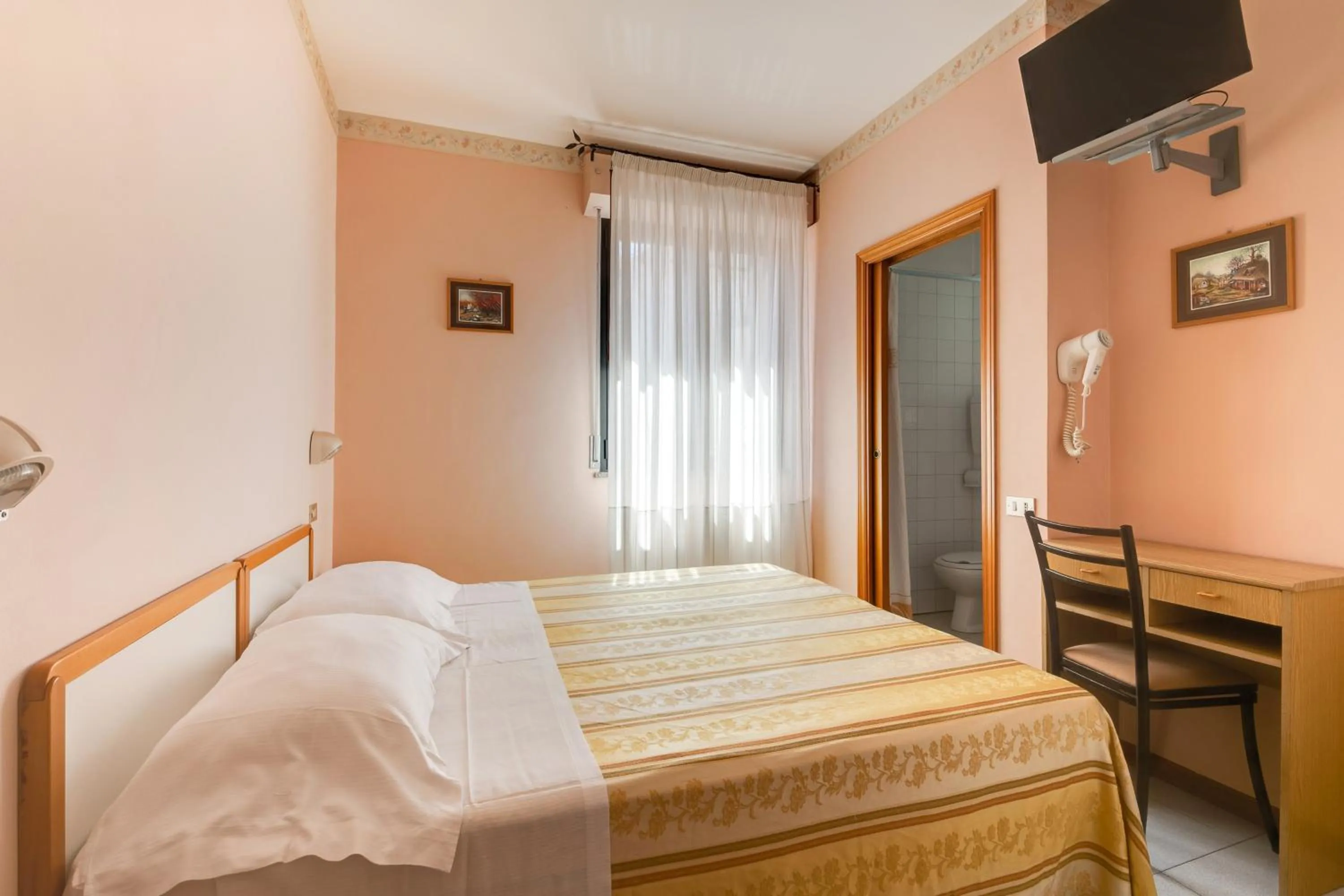 Bed in Hotel Sorriso