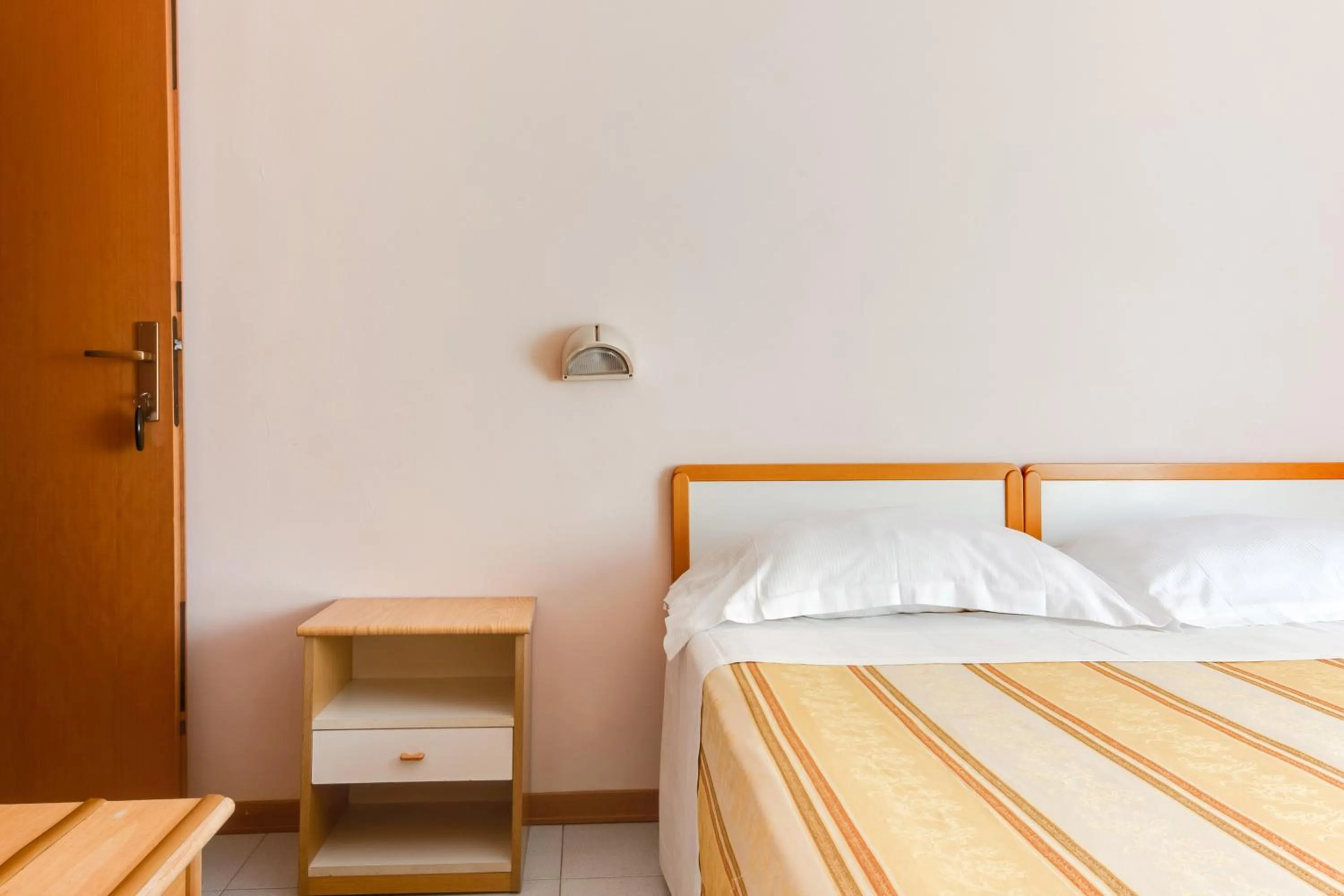 Bed in Hotel Sorriso