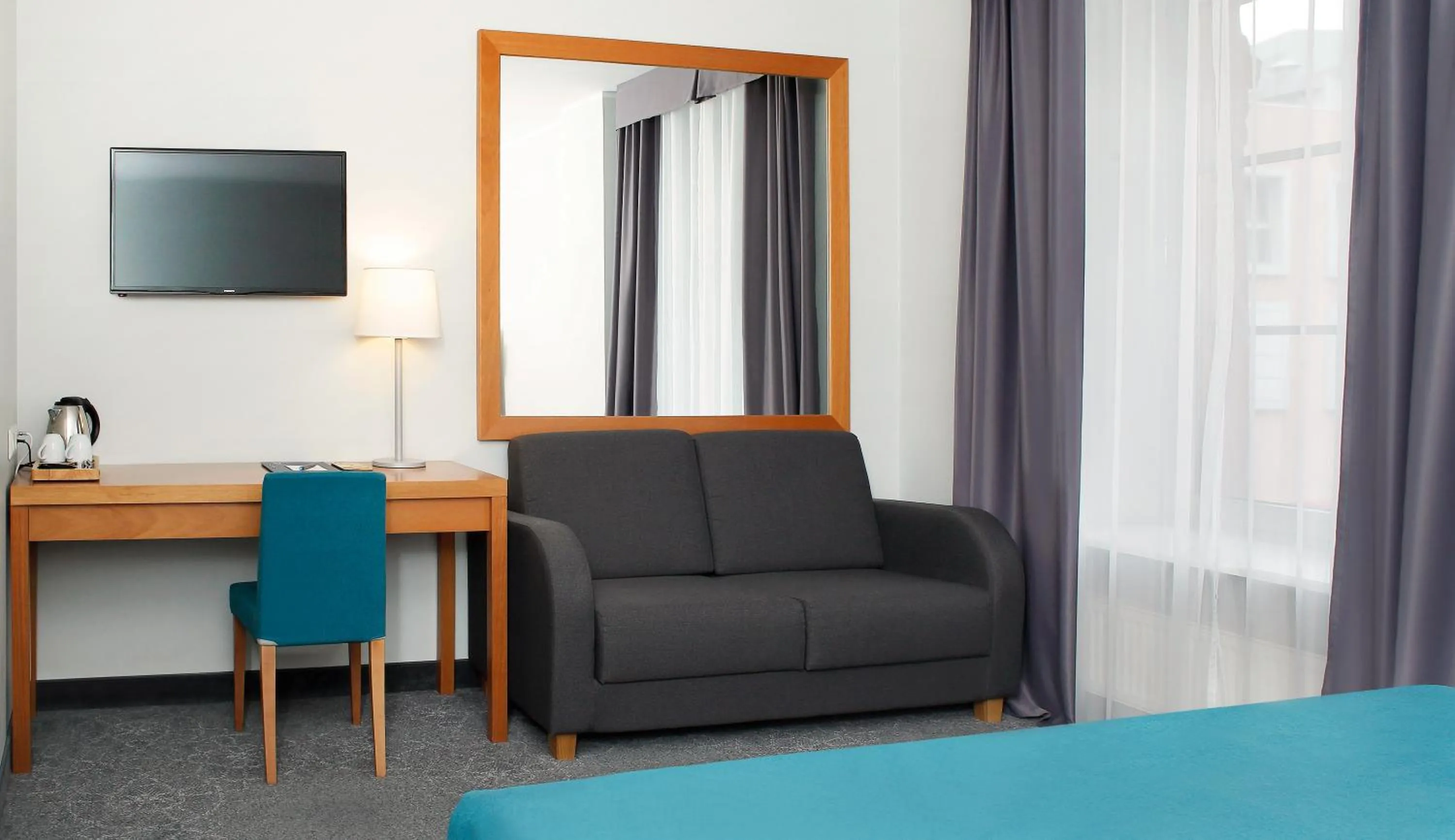 TV and multimedia, Bed in Hestia Hotel Ilmarine