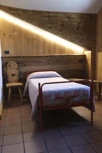 Bed in Hotel Ristoro Vagneur