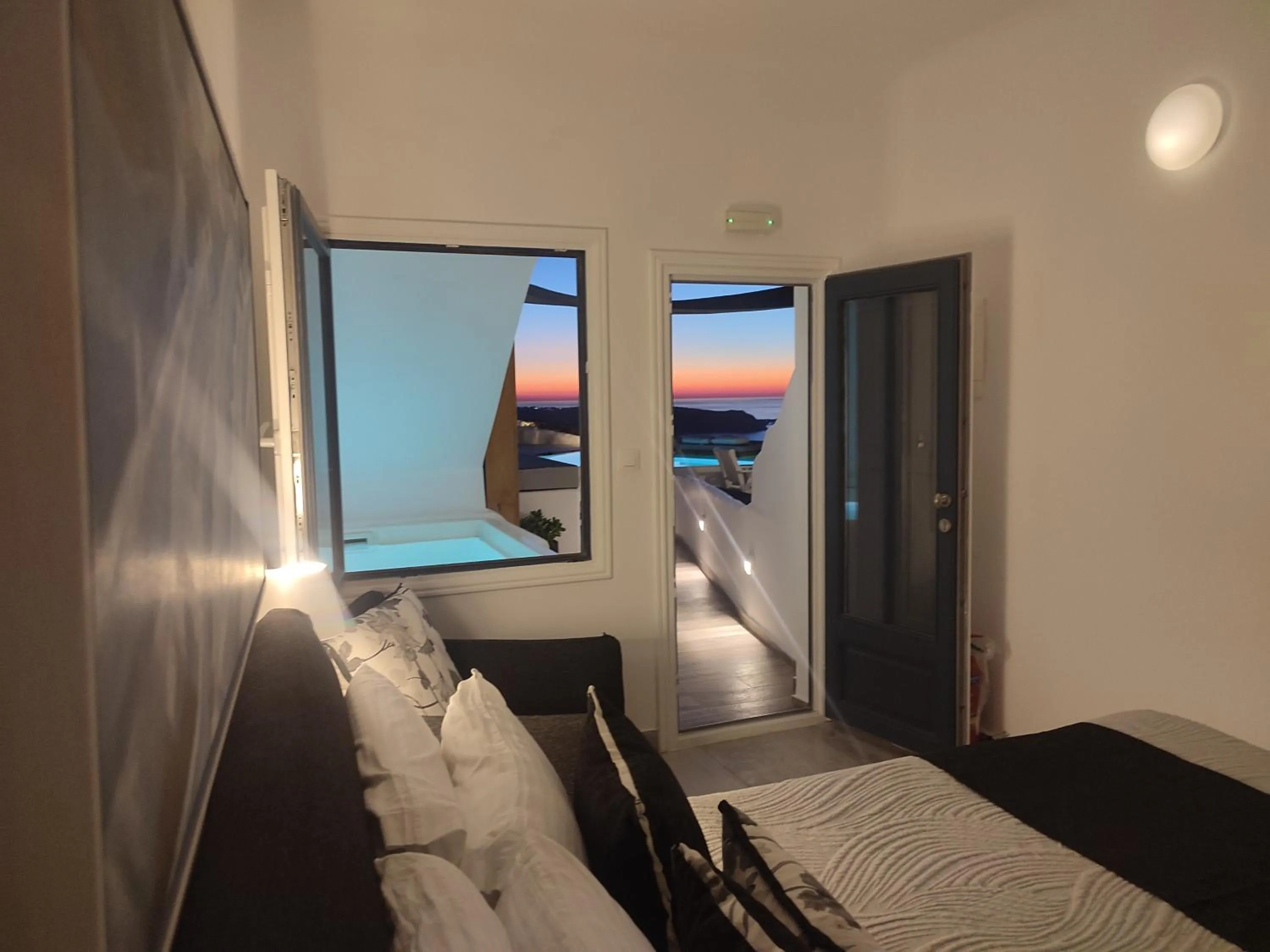 Photo of the whole room, Bed in Amaze Suites