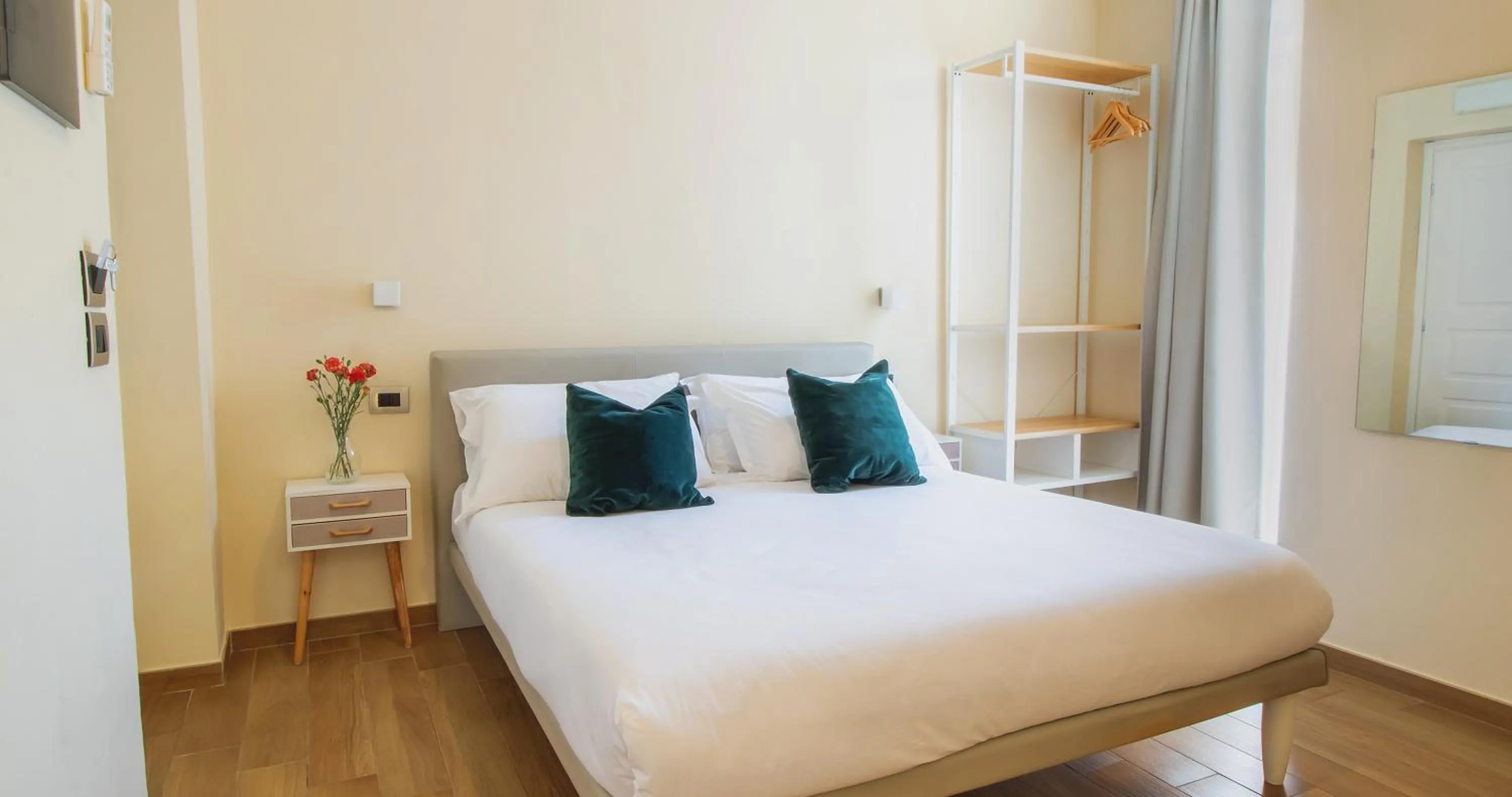 Bed in Musto Suites & Rooms