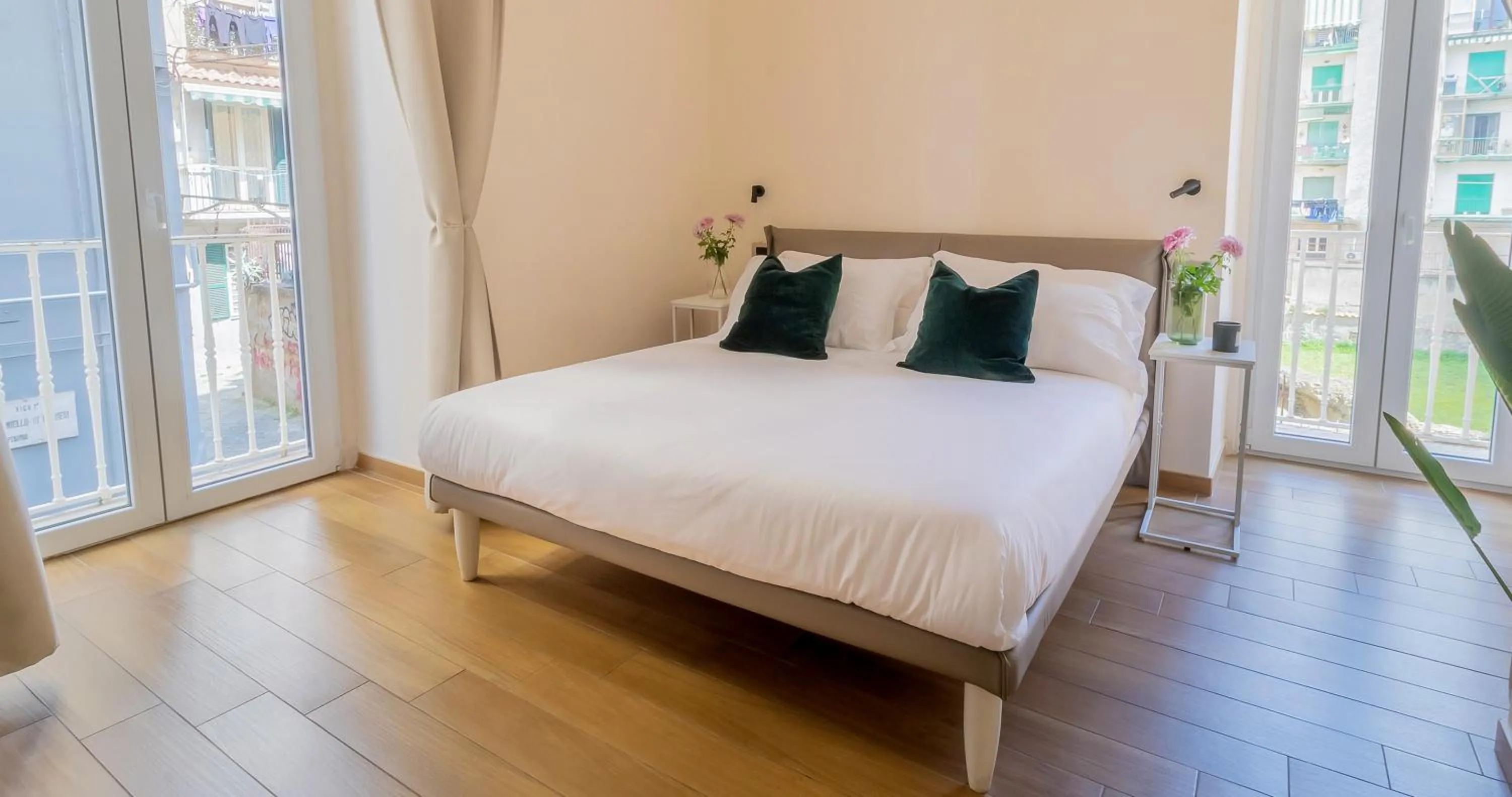 Bed in Musto Suites & Rooms