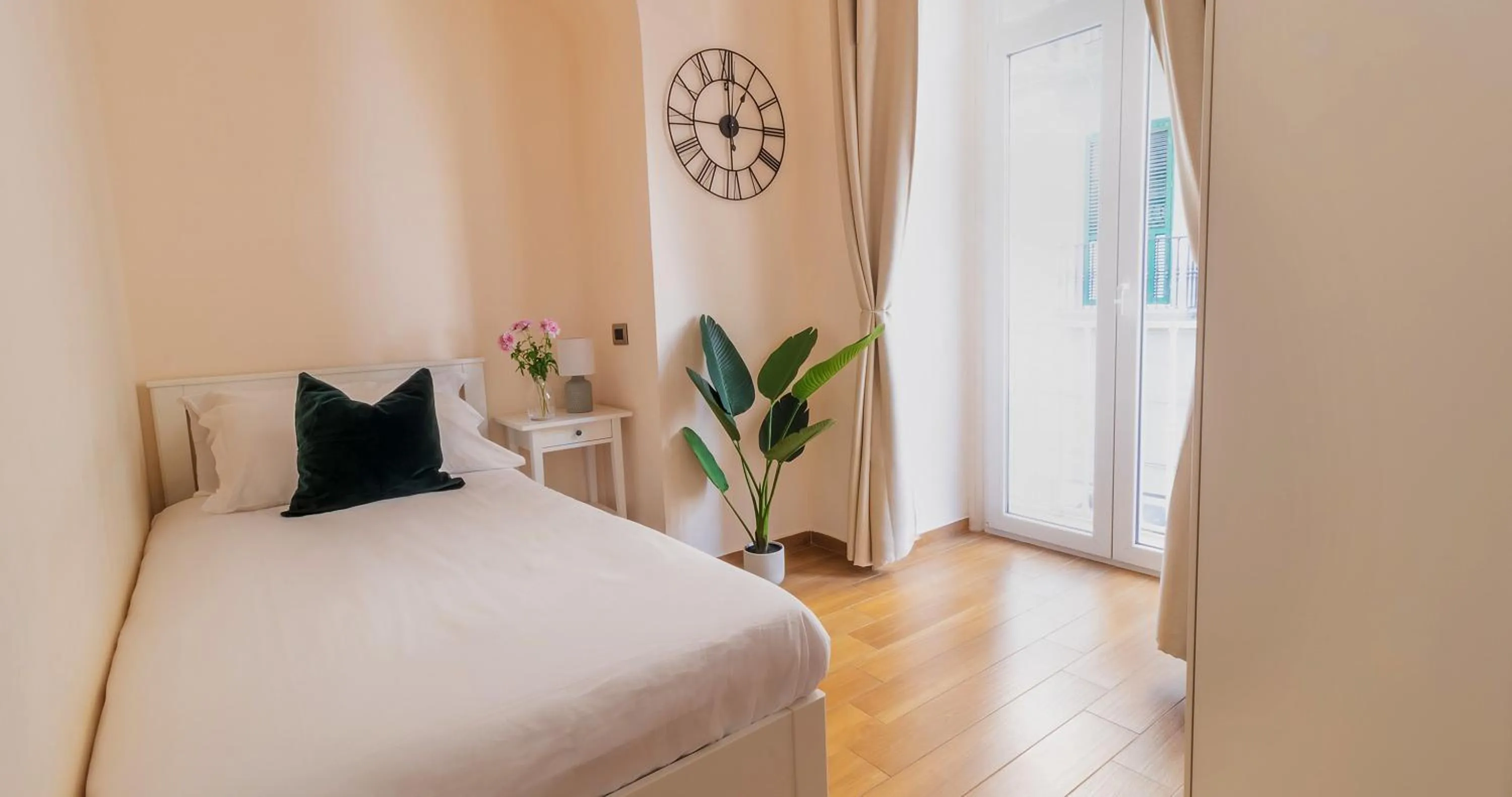 Bed in Musto Suites & Rooms