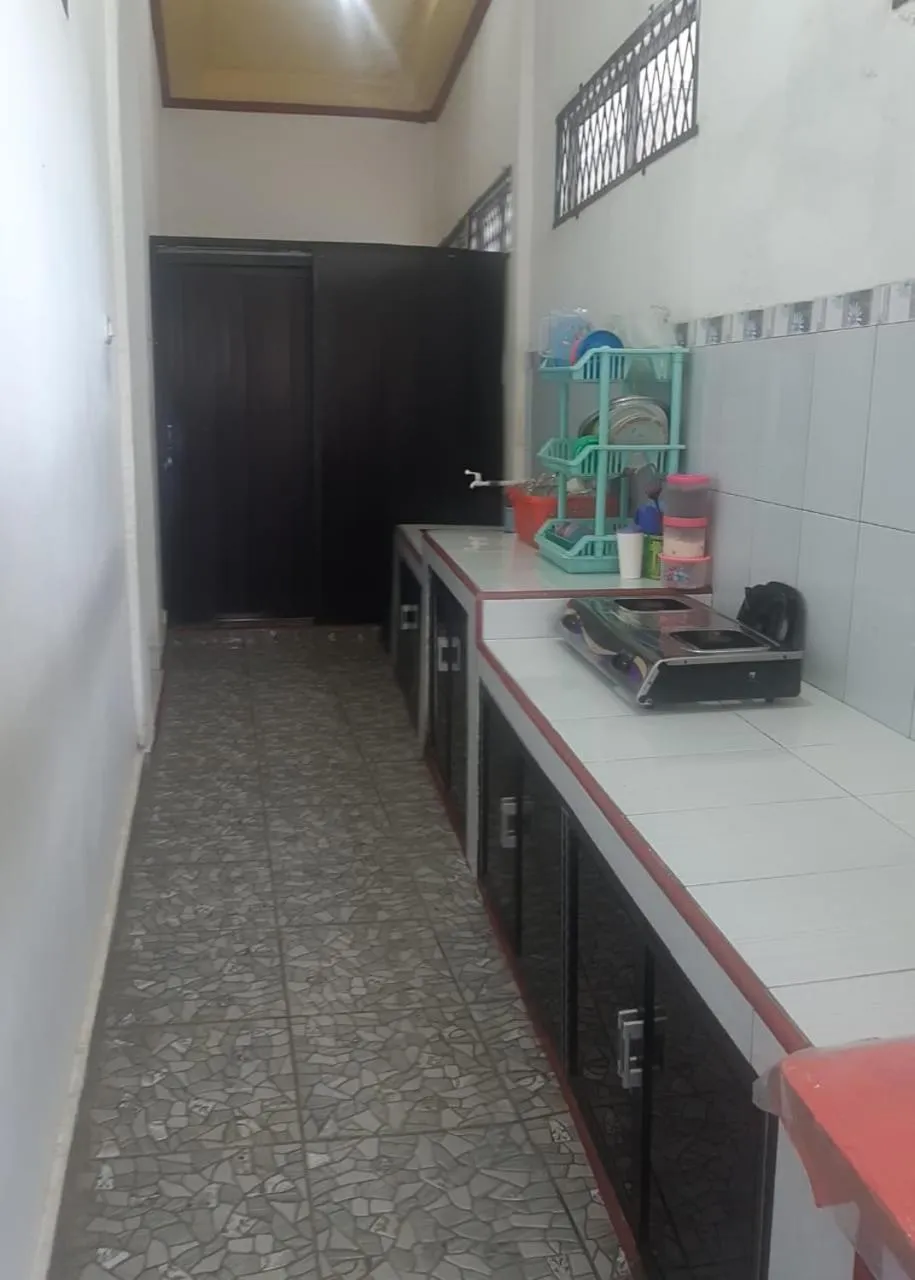 Kitchen or kitchenette in Losmen Ibu Hj. Tarjo