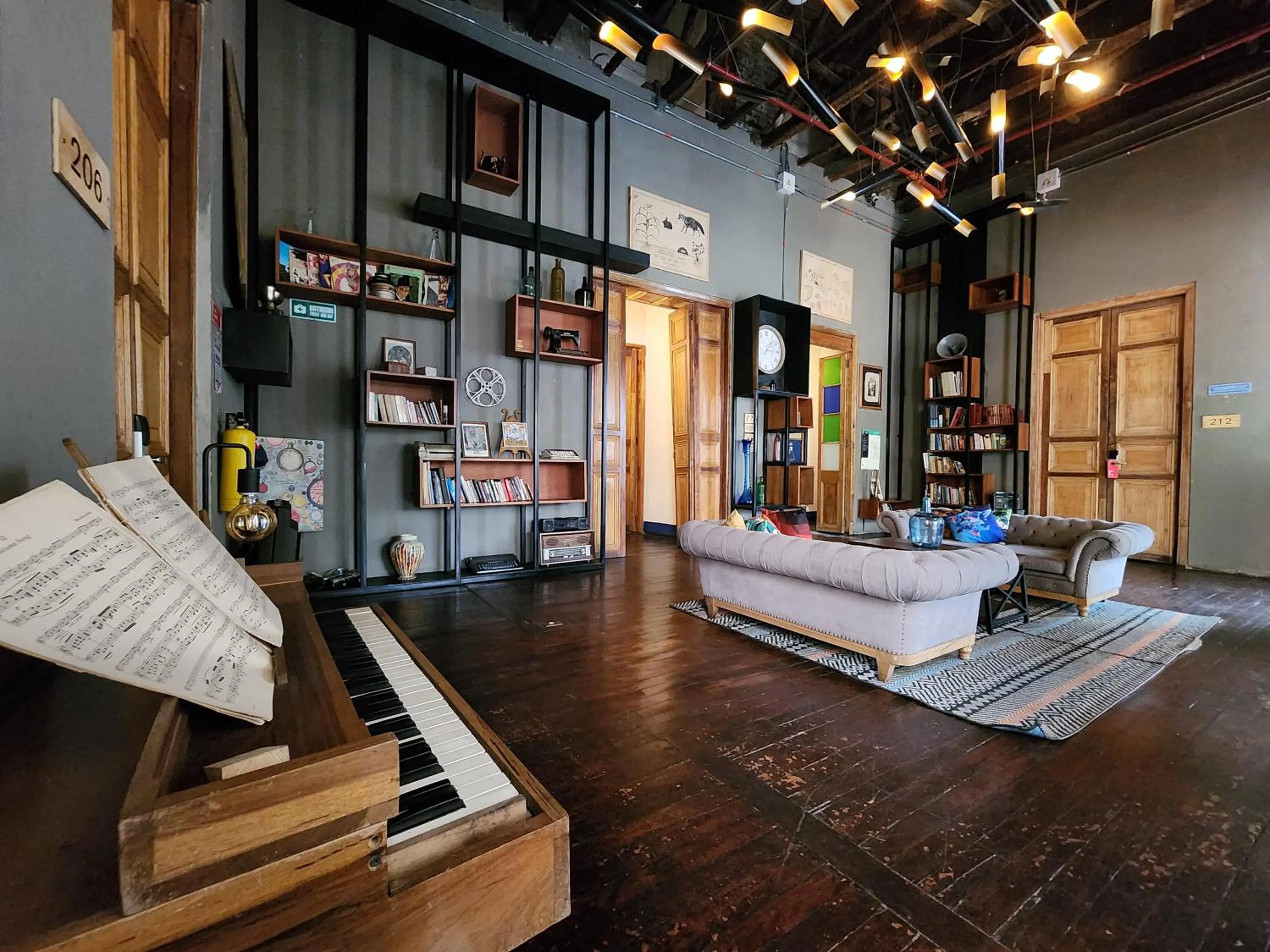 Living room in Delgadillo Hotel by Socialtel