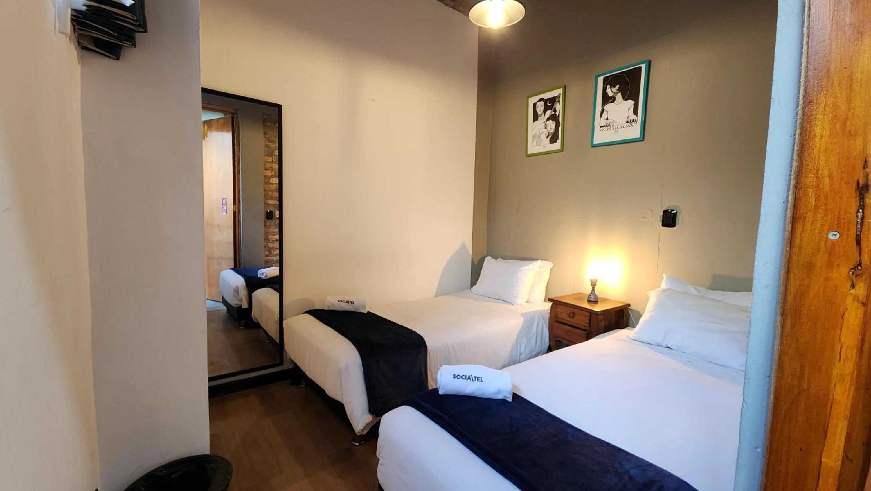 Bed in Delgadillo Hotel by Socialtel