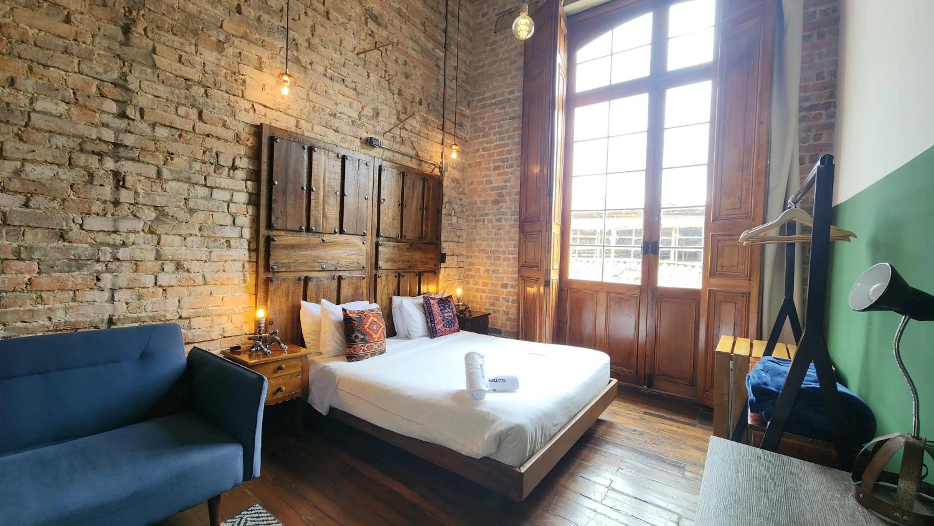 Bed in Delgadillo Hotel by Socialtel