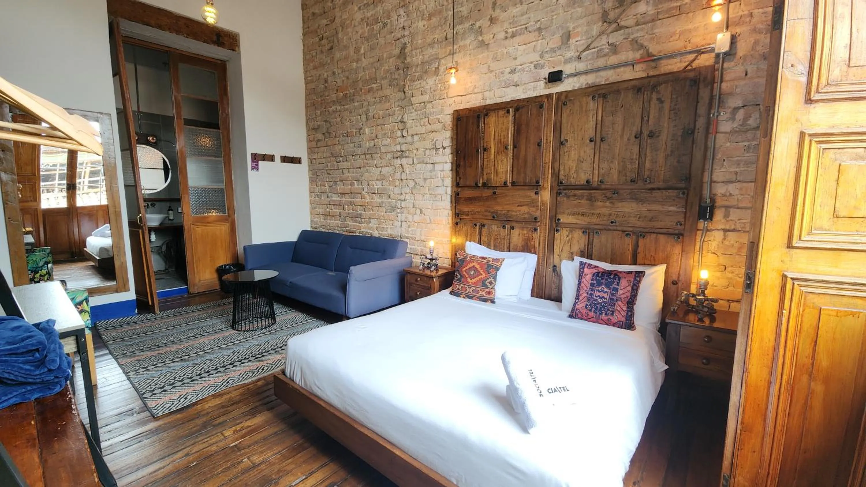 Bed in Delgadillo Hotel by Socialtel