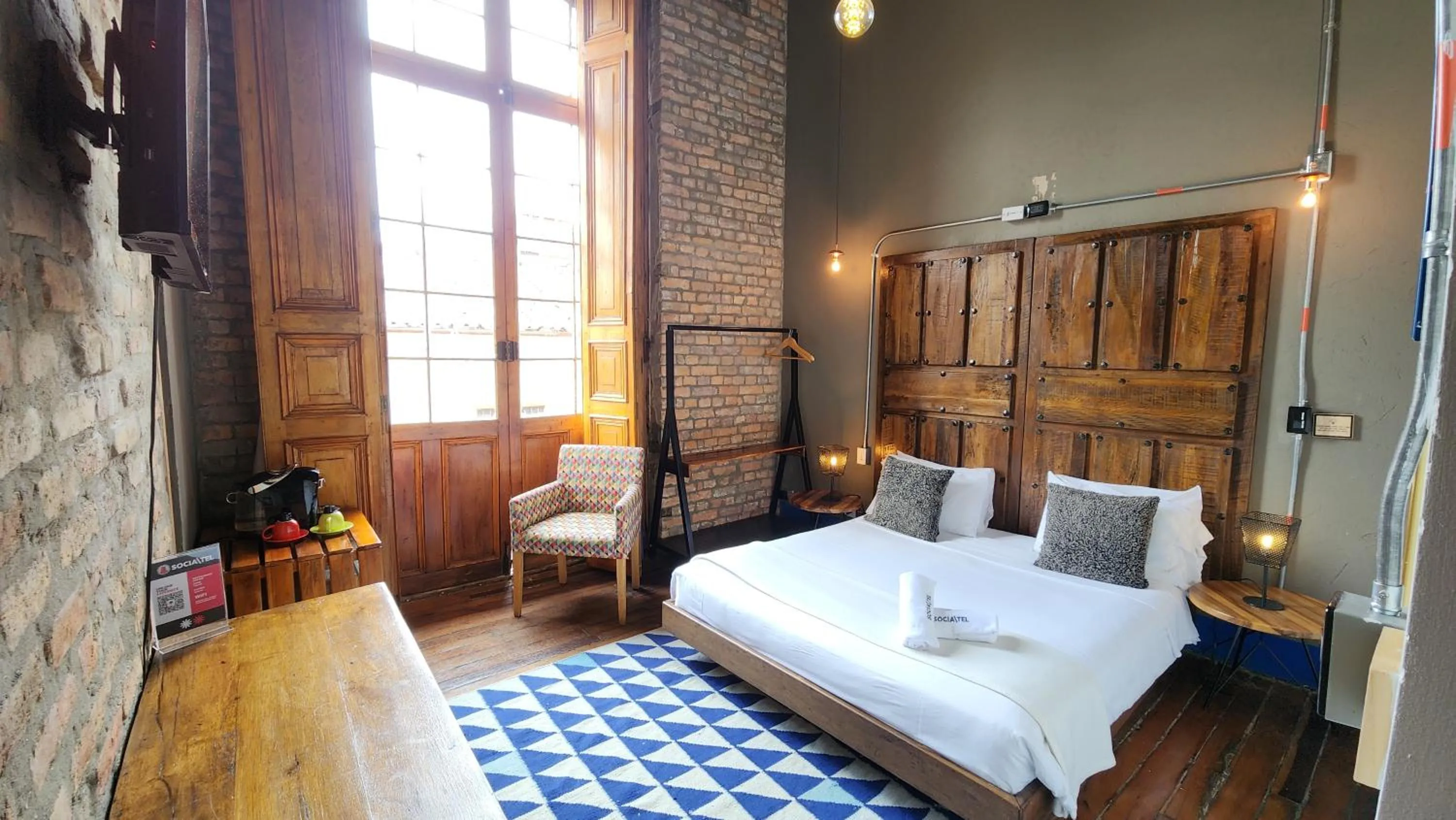 Bed in Delgadillo Hotel by Socialtel